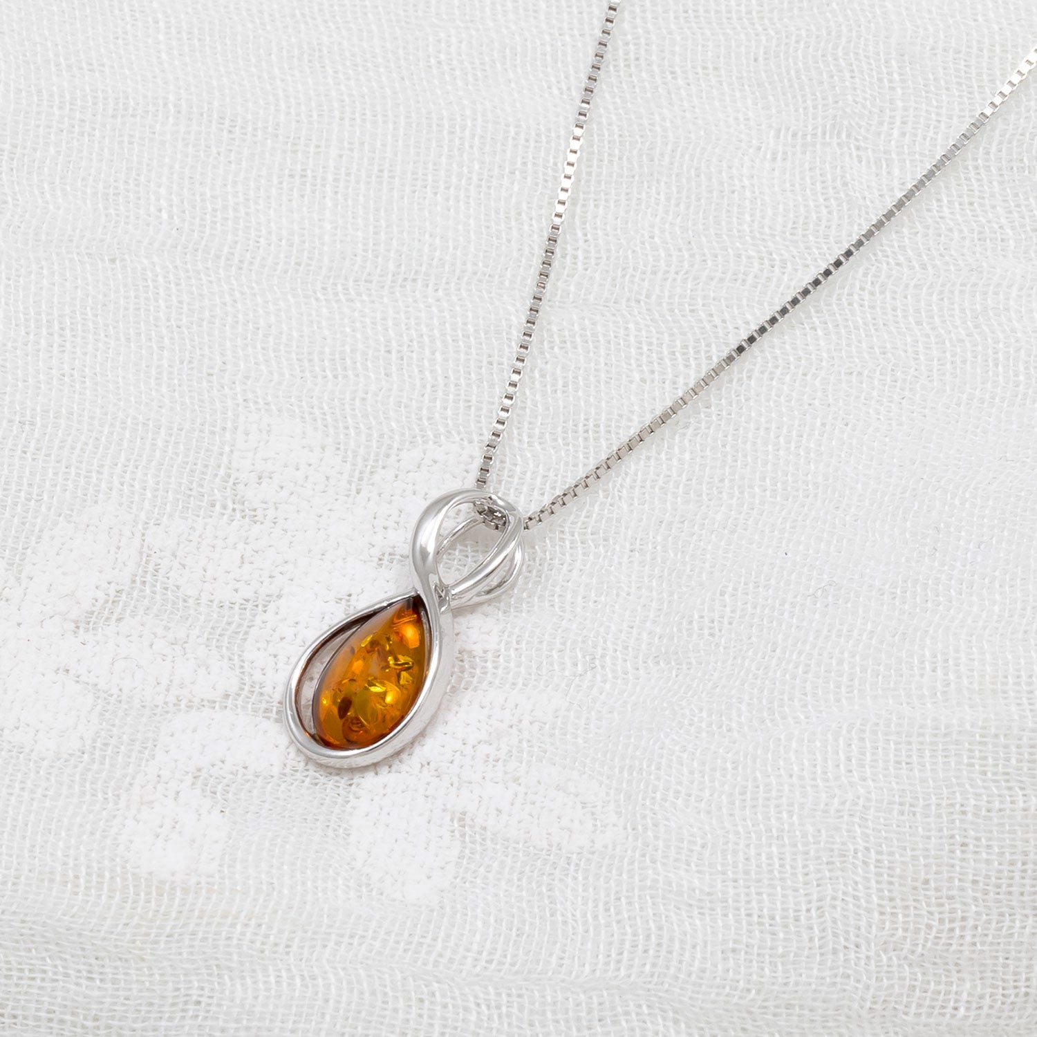 Silver Infinity Amber Pendant
