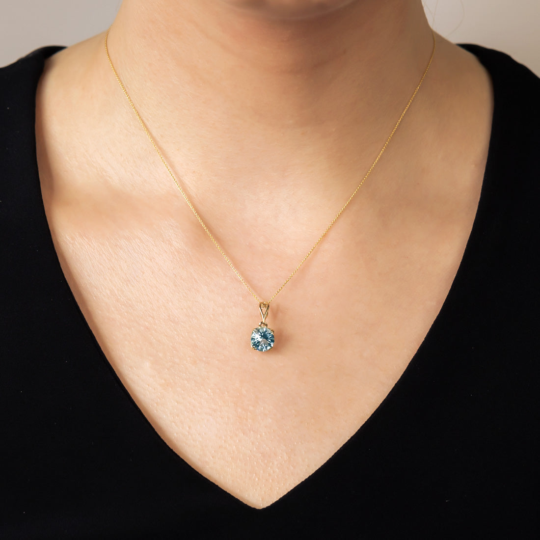 9 Carat Gold Blue Topaz Solitaire Pendant