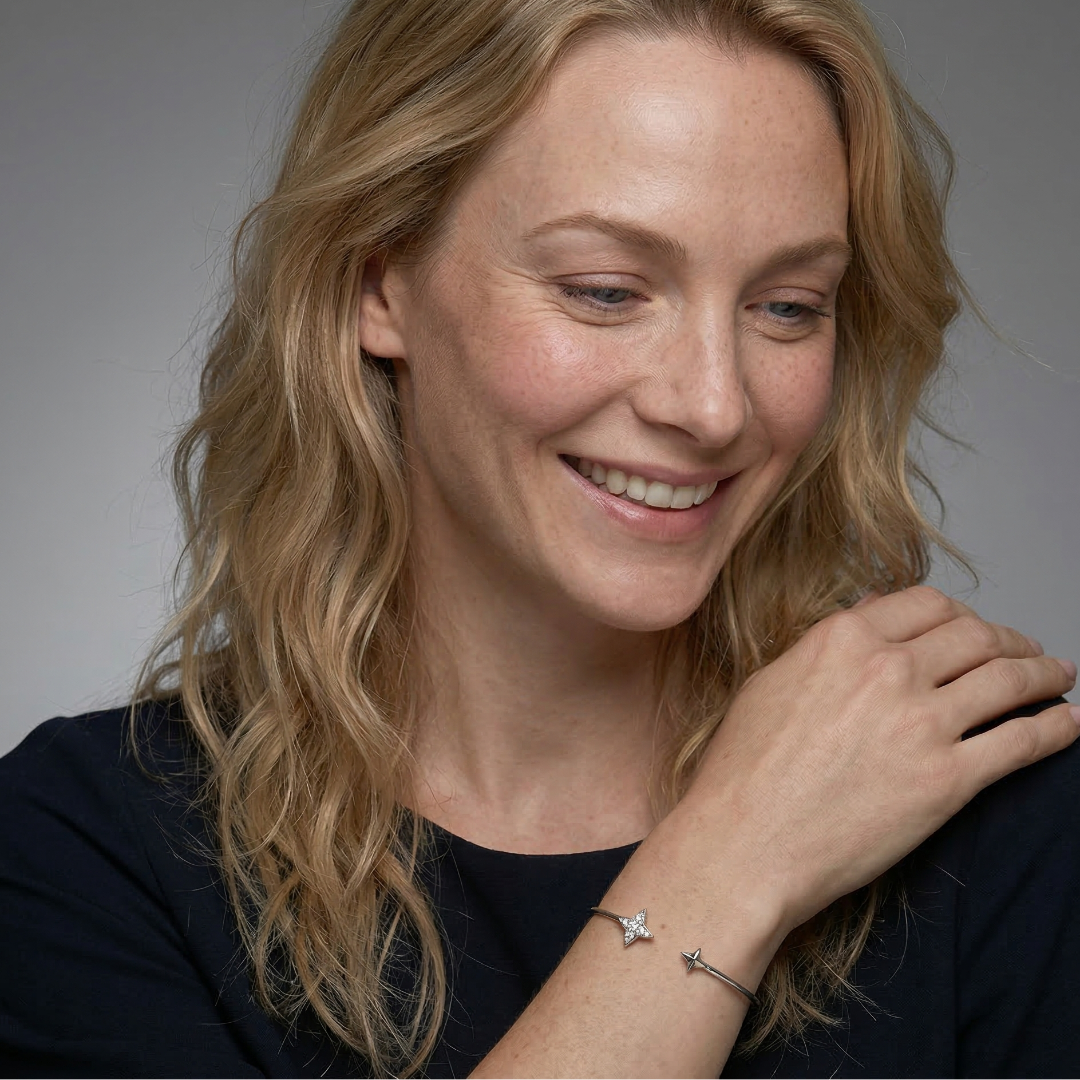 Sterling silver flexi cuff featuring sculptural star motifs with a polished finish, showcasing elegant British design in contemporary silver jewellery by Azendi.