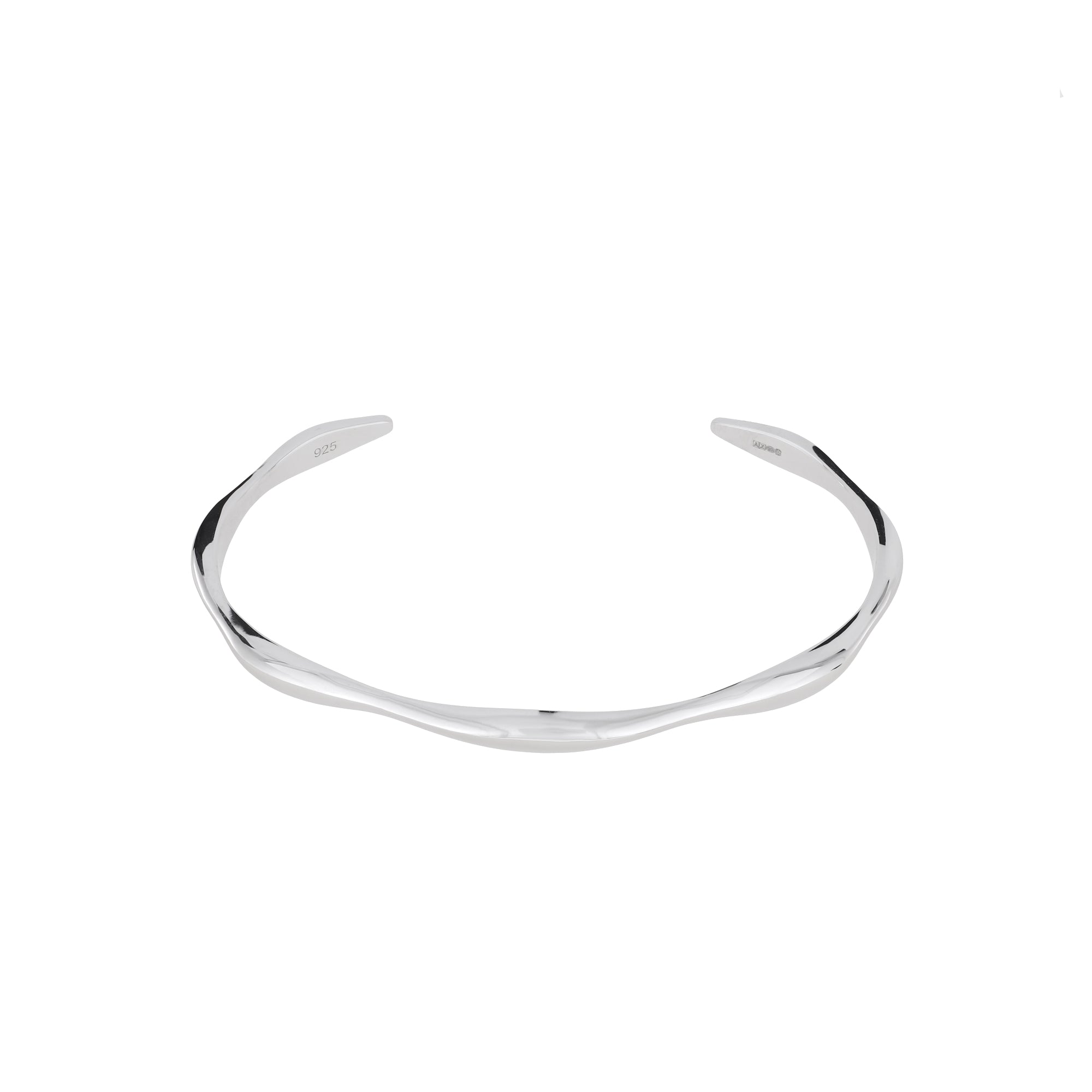 Sterling silver cuff bangle featuring a gently undulating wave design with a polished finish, showcasing contemporary elegance in sculptural silver jewellery.