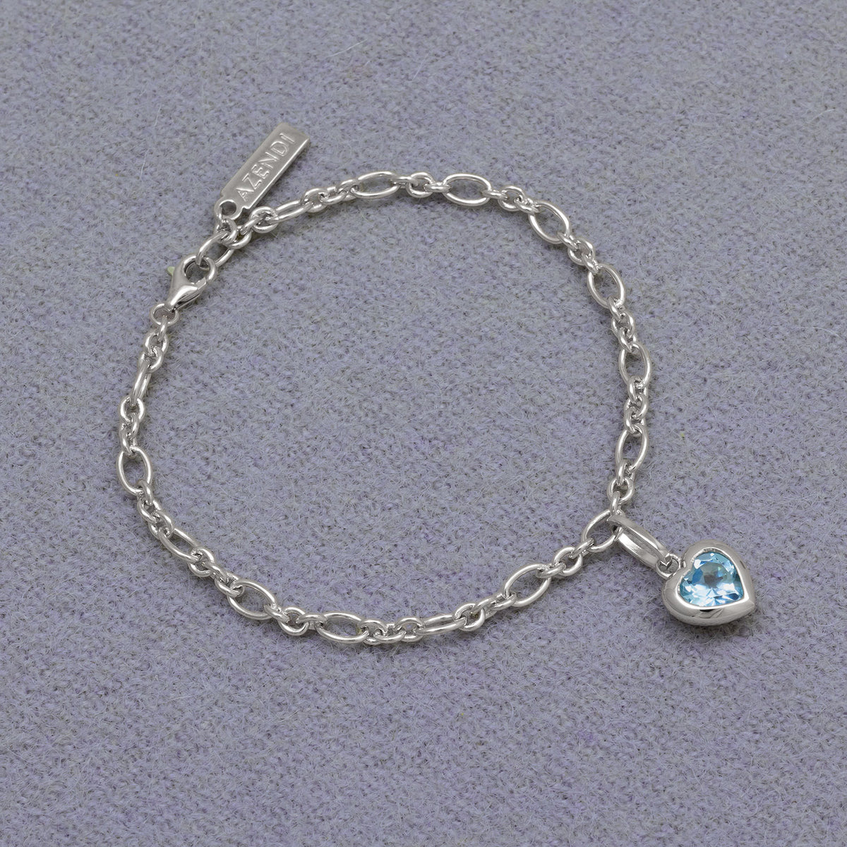 Sterling Silver &amp; Blue Topaz Heart Charm Bracelet