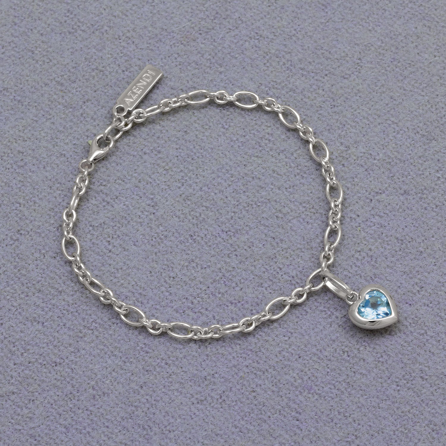 Sterling Silver & Blue Topaz Heart Charm Bracelet