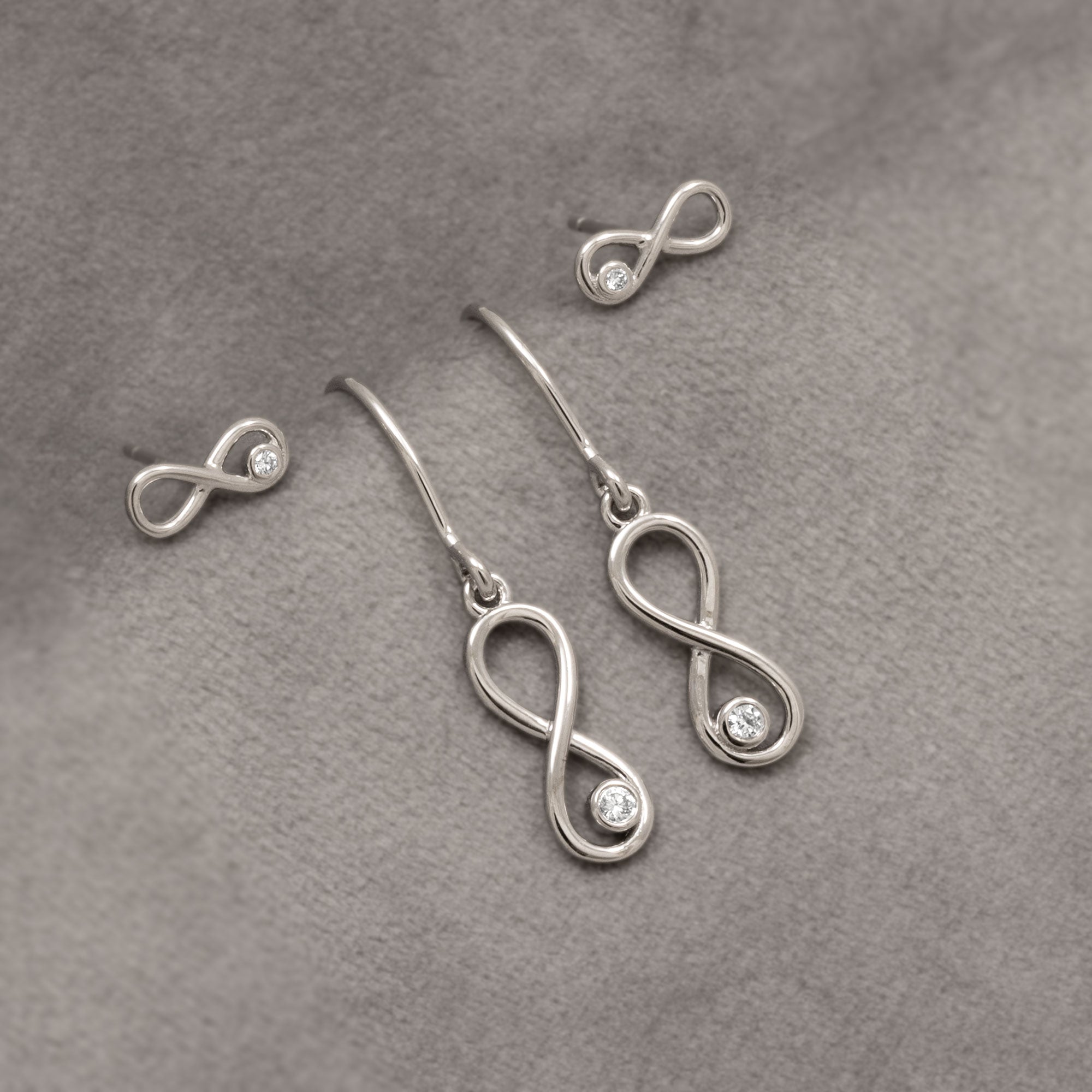 Silver & Solitaire 0.08 Carat Lab Grown Diamond Infinity Stud Earrings