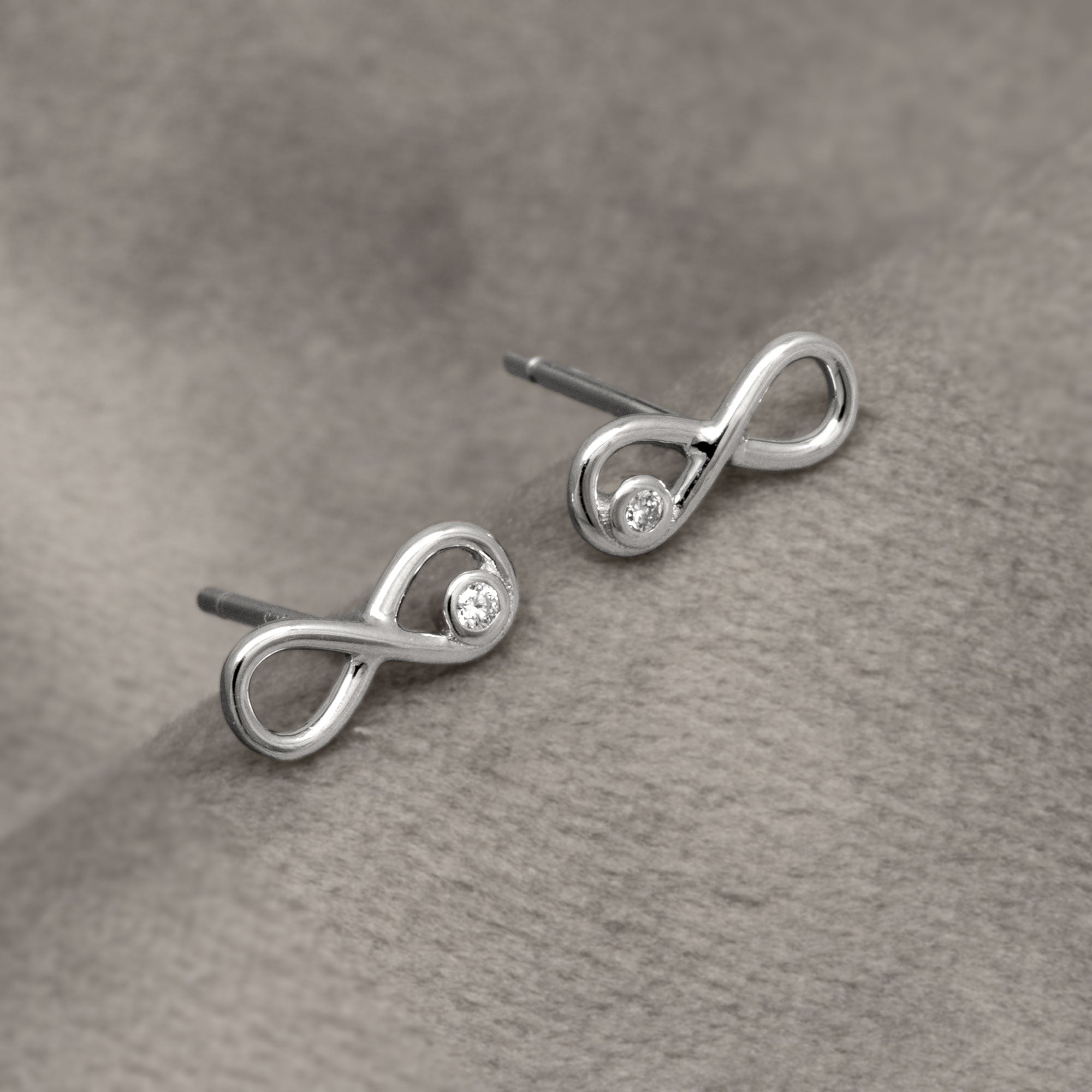 Silver & Solitaire 0.08 Carat Lab Grown Diamond Infinity Stud Earrings