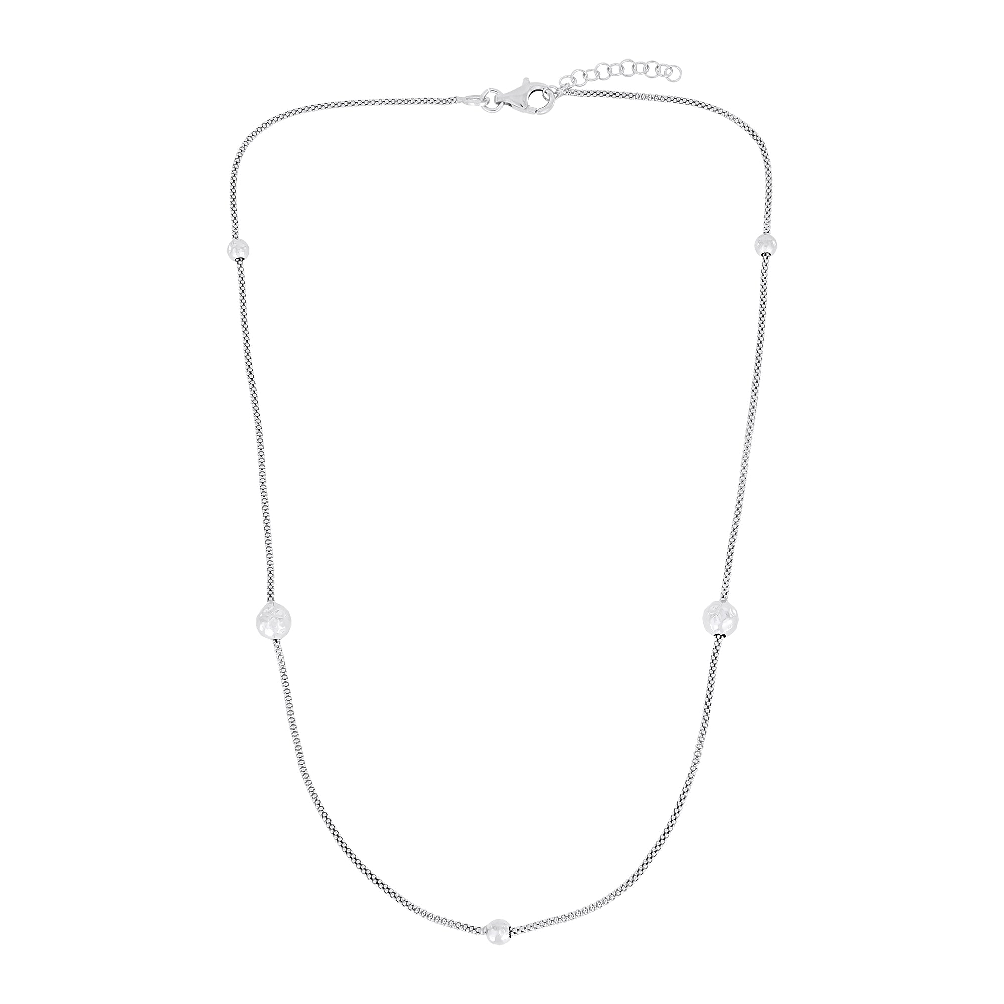 Sterling silver popcorn chain necklace with textured beads on a white background
