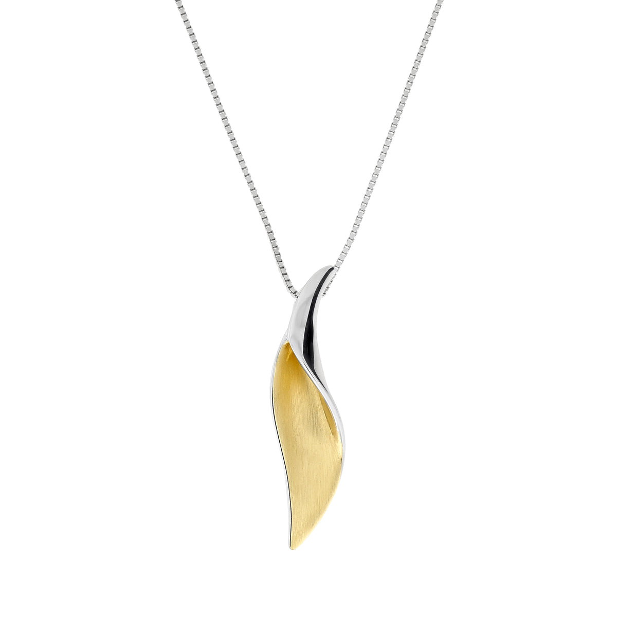A two-tone leaf-shaped pendant necklace on a delicate silver chain. The pendant features a polished silver outer edge and a brushed gold vermeil inner surface.
