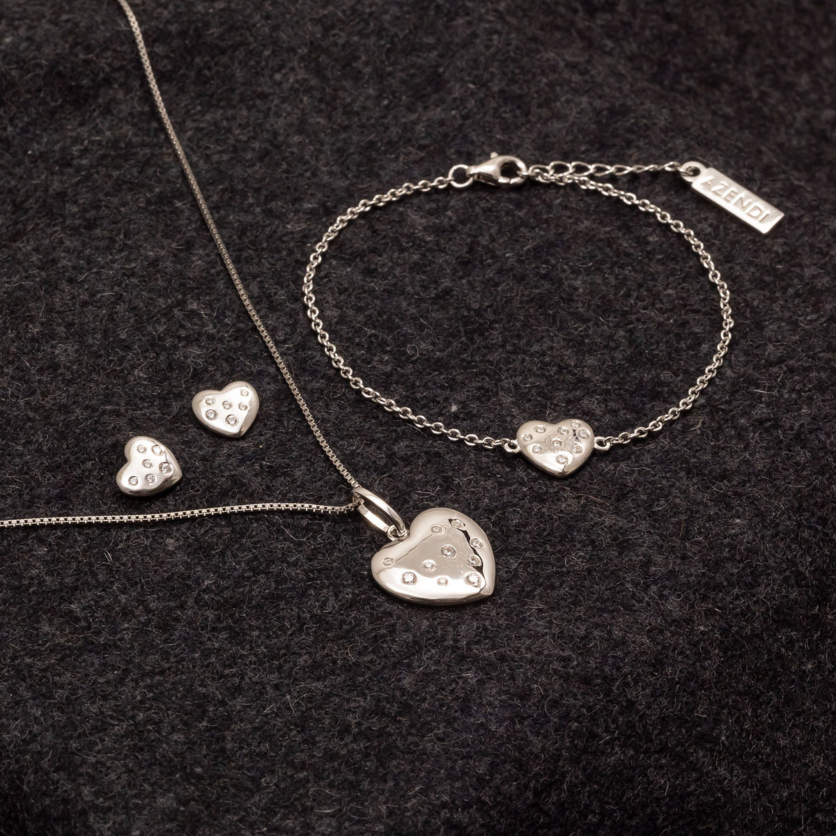 Sterling Silver Scattered Stones Heart Bracelet
