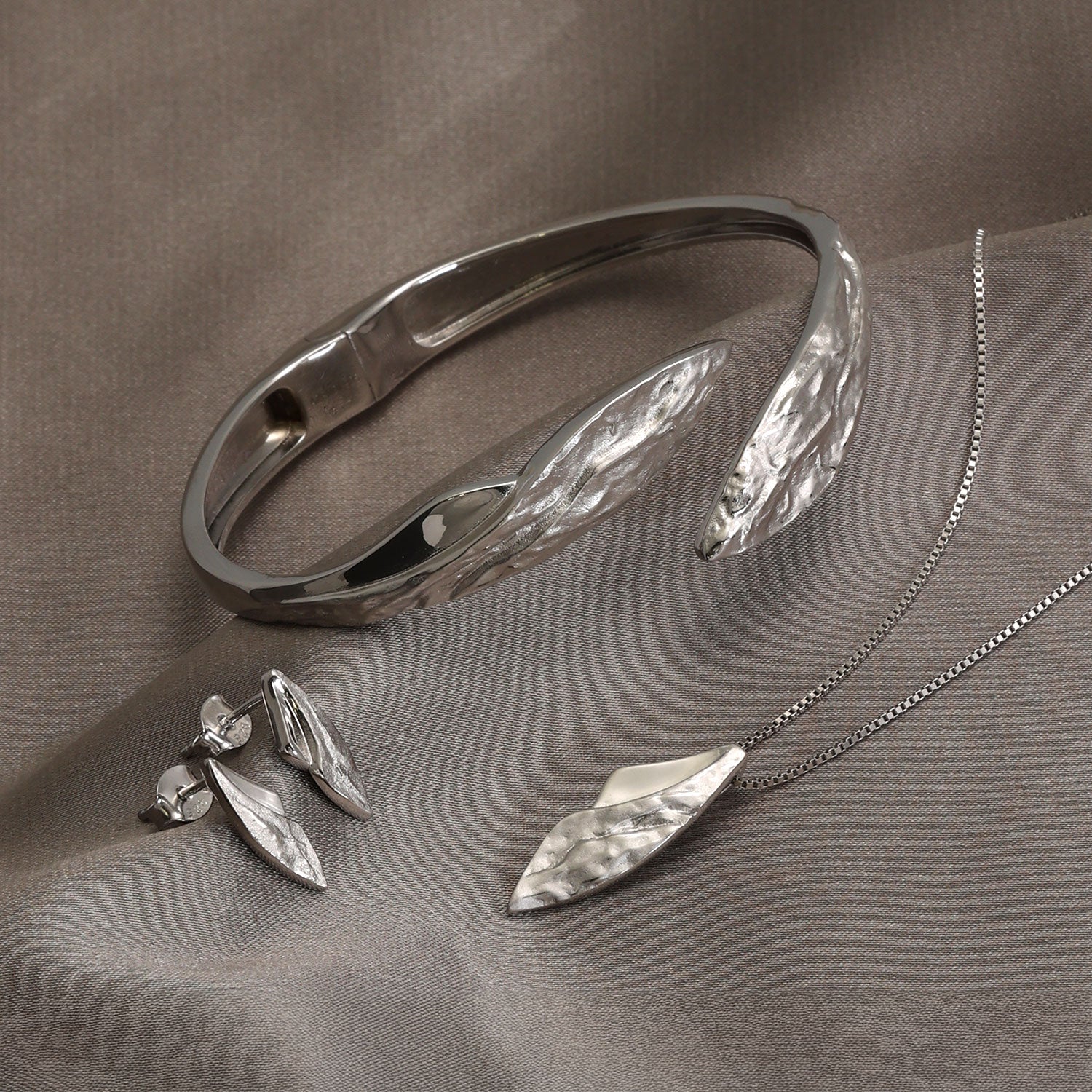 Malham Cove Curved Textured & Polished Stud Earrings