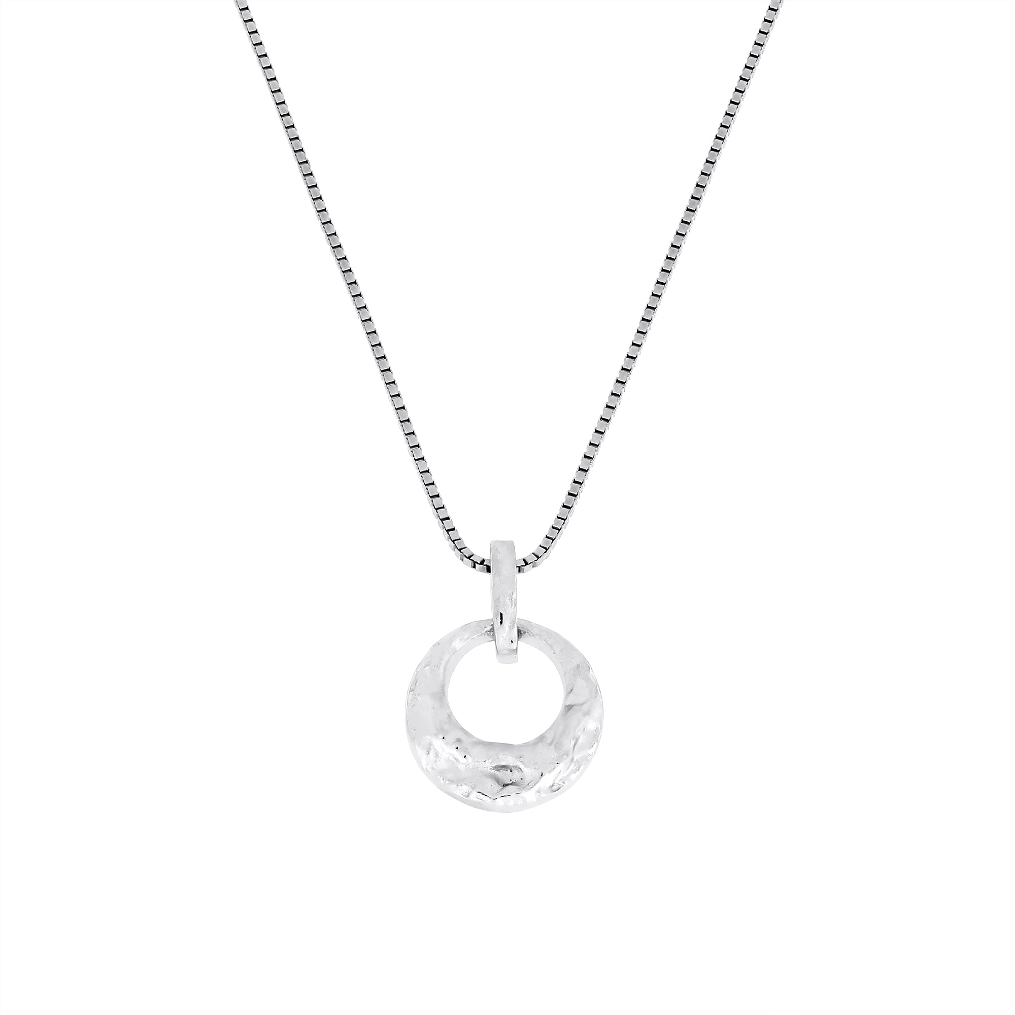 Sterling silver pendant necklace featuring a textured circular design suspended from a delicate chain, showcasing a sculptural and contemporary aesthetic.