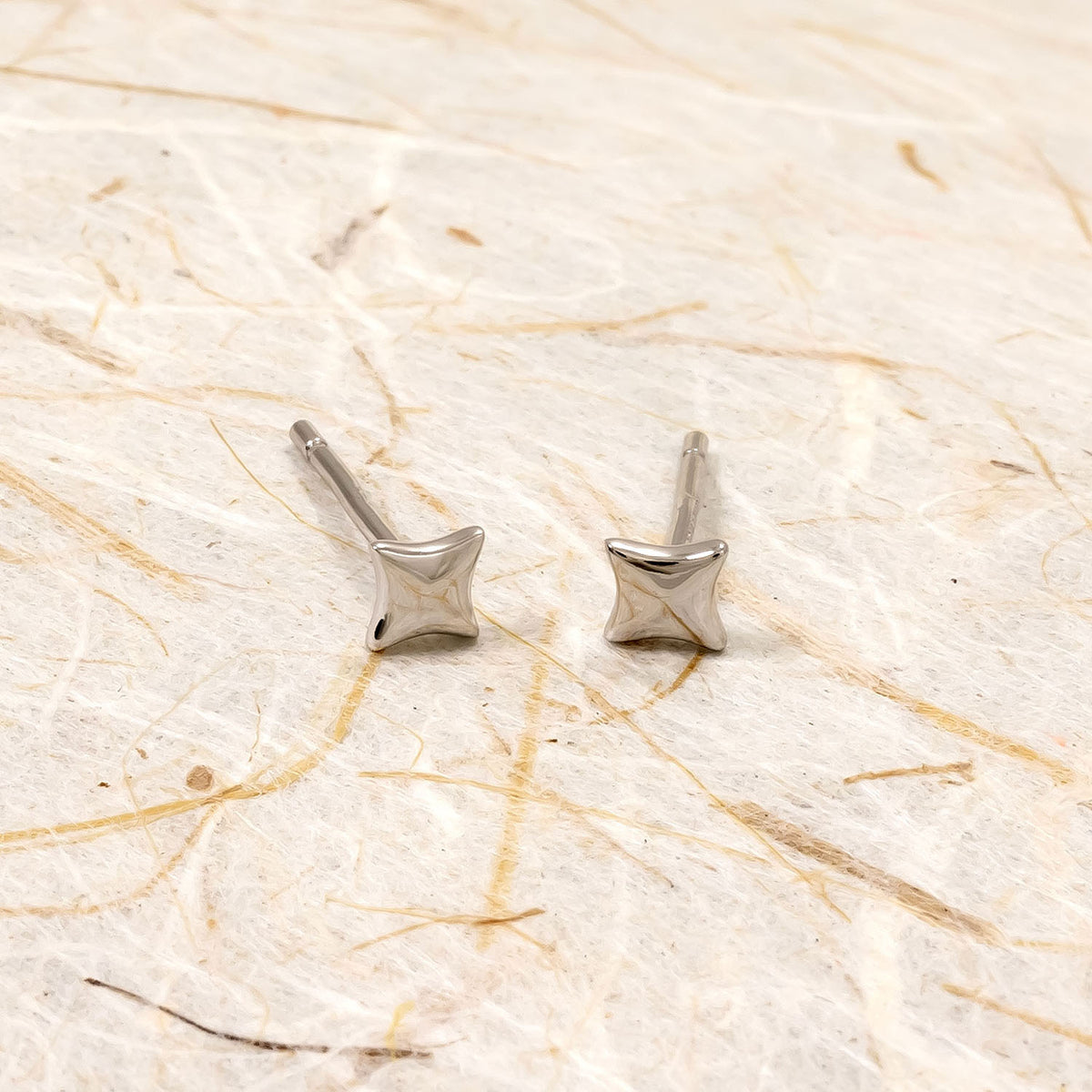 Polished Four-Point Star Stud Earrings