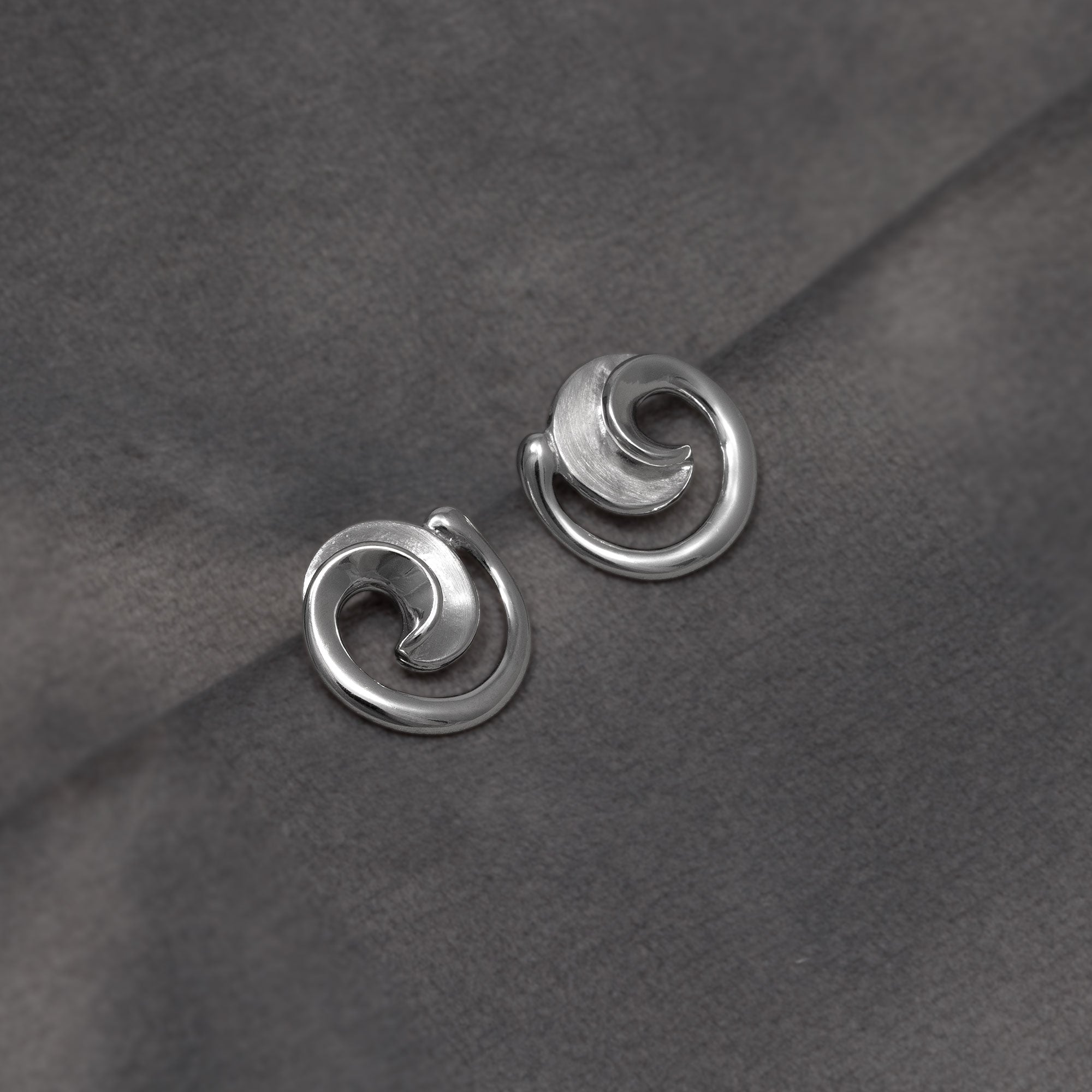 Silver Satin and Polished Curling Stud Earrings