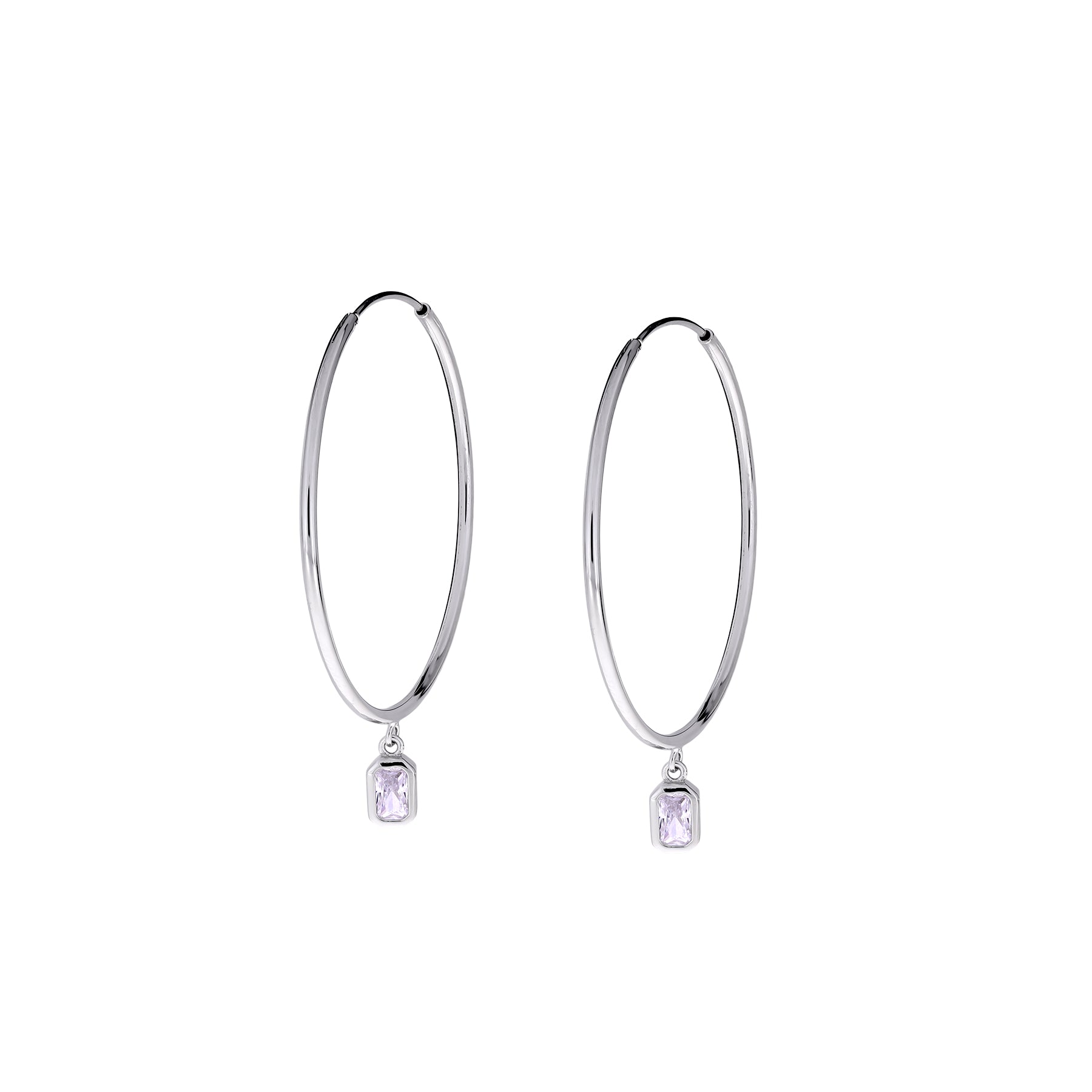 Slim sterling silver hoop earrings featuring a delicate rectangular stone charm drop, showcasing refined British design and elegant contemporary silver jewellery craftsmanship.