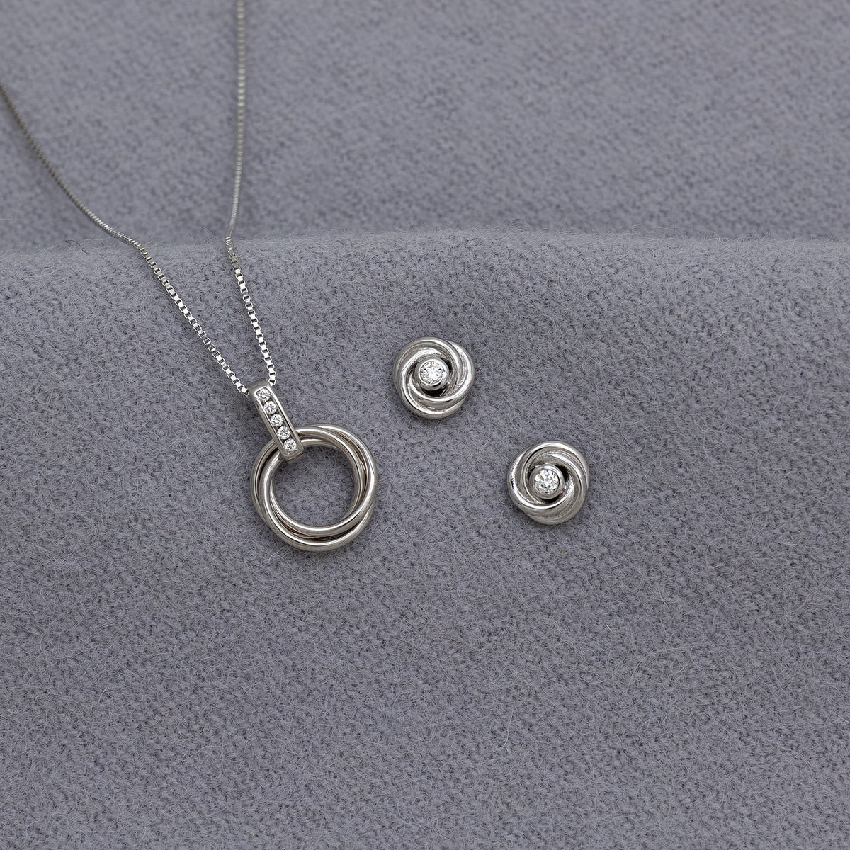 Entangled Silver & 0.06 Carat Lab Grown Diamond Love Knot Pendant