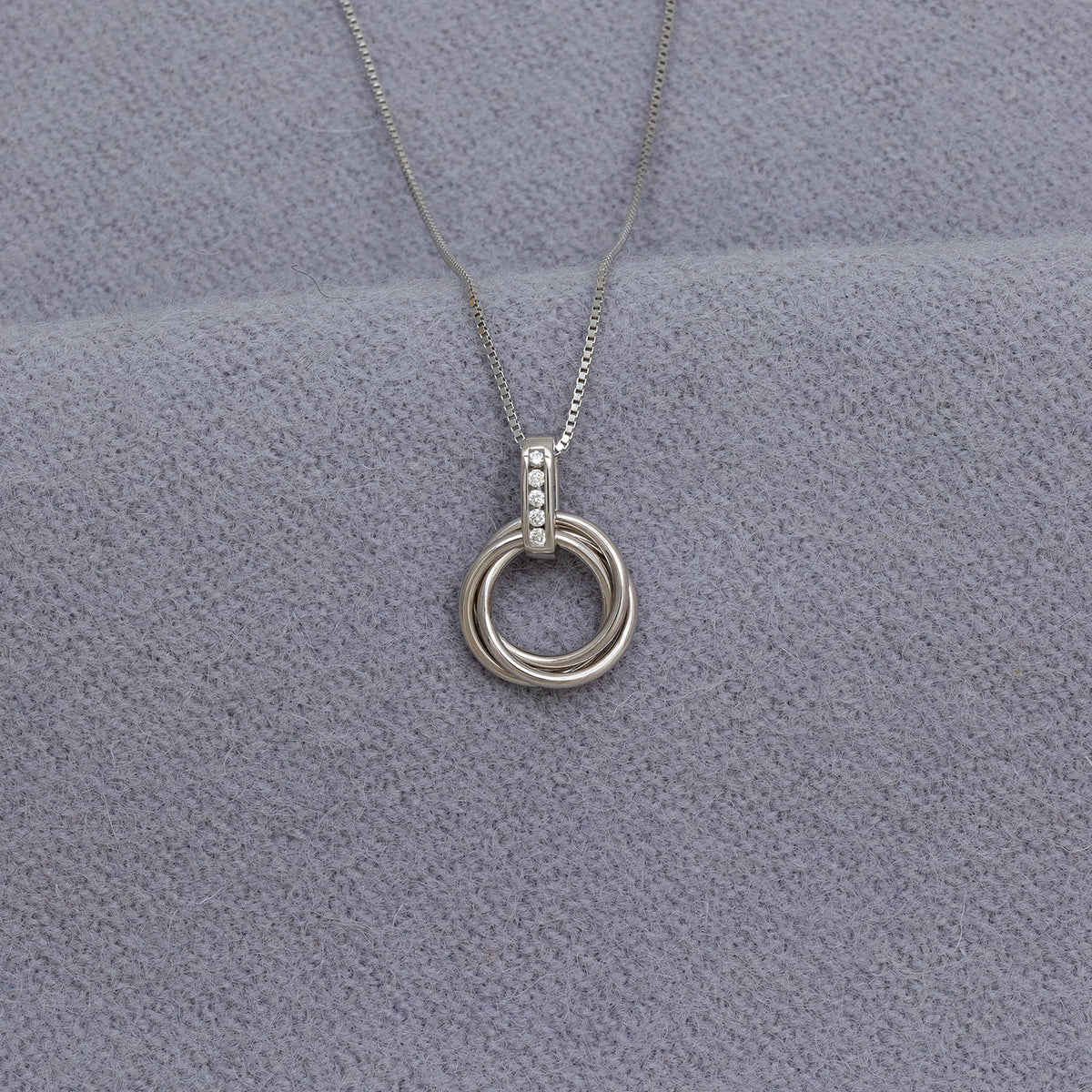 Entangled Silver & 0.06 Carat Lab Grown Diamond Love Knot Pendant