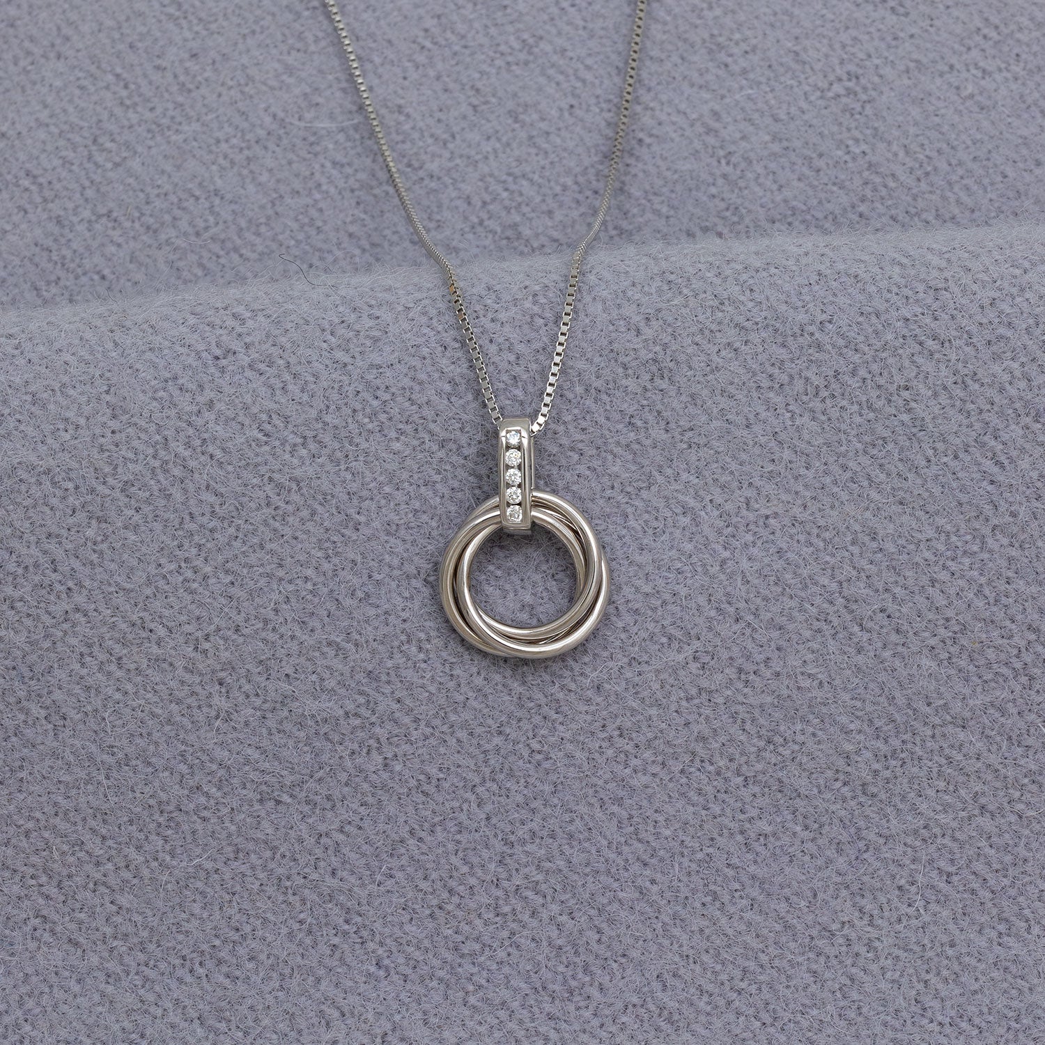 Entangled Silver & 0.06 Carat Lab Grown Diamond Love Knot Pendant