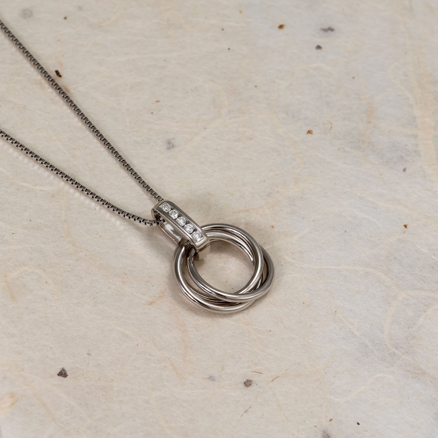 Entangled Silver & 0.06 Carat Lab Grown Diamond Love Knot Pendant