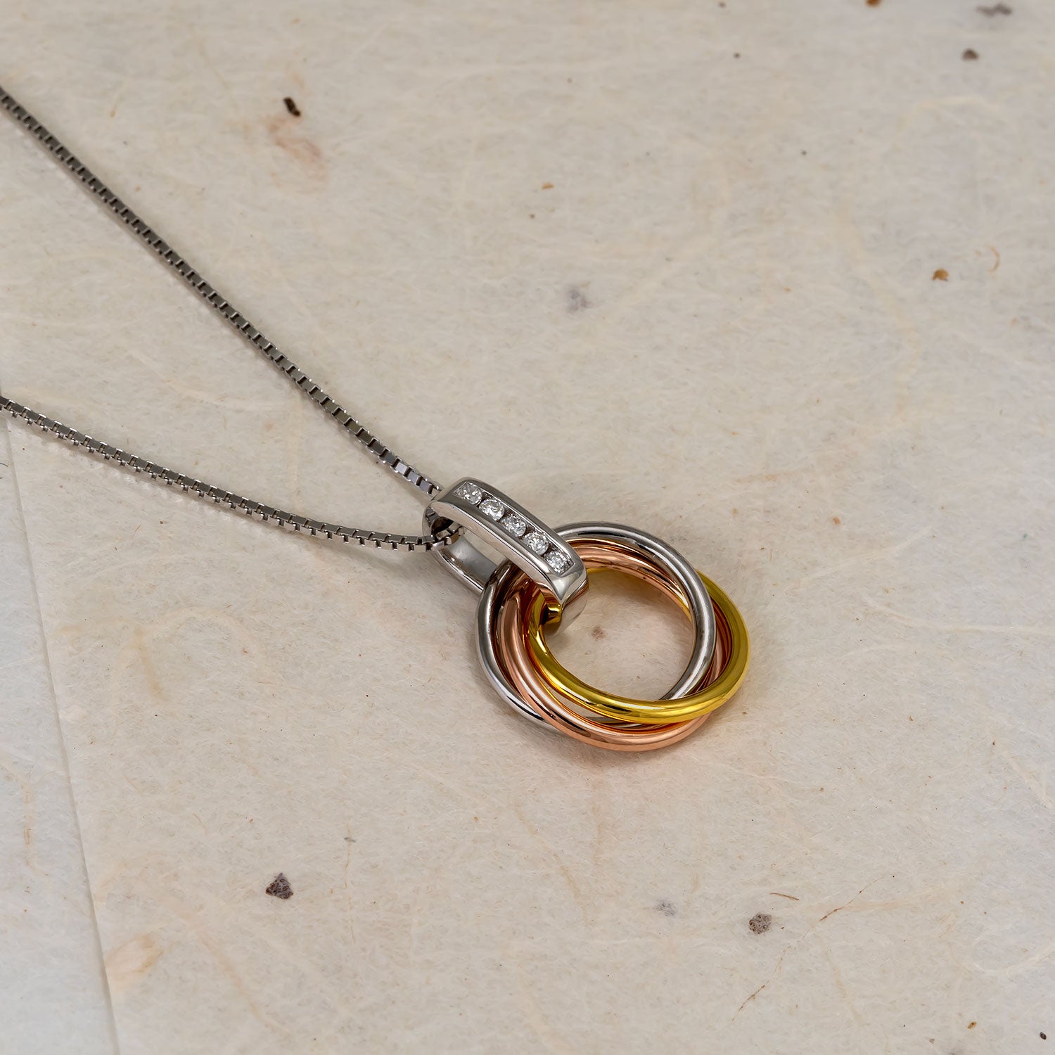 Entangled Mixed Vermeil & 0.06 Carat Lab Grown Diamond Love Knot Pendant