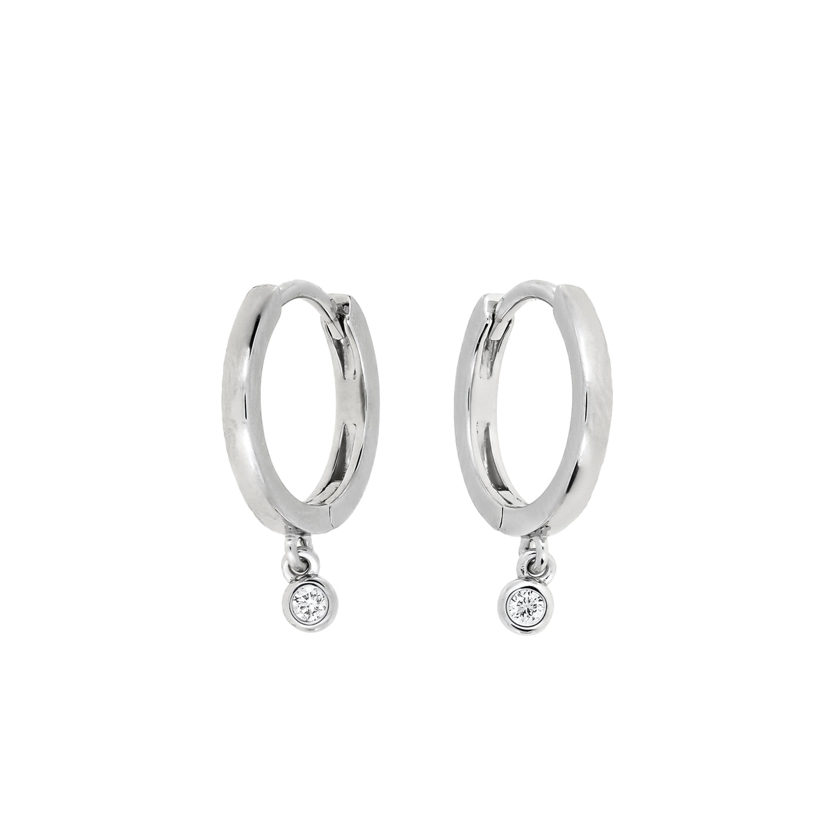 Pair of polished sterling silver hinged hoop earrings featuring delicate lab grown diamond charms that gently dangle, exemplifying sleek modern silver jewellery design.