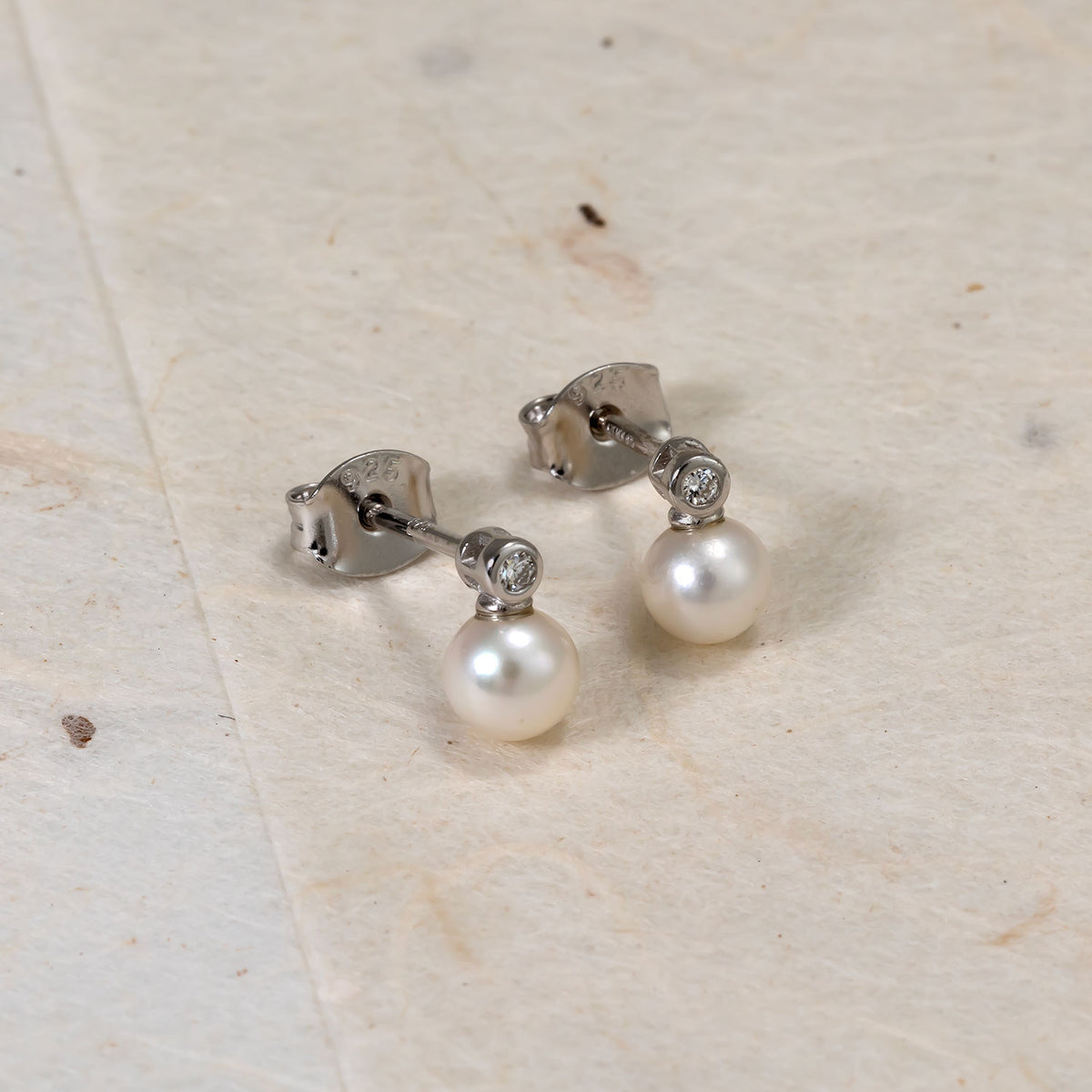Sterling Silver, Freshwater Pearl & 0.03 Carat Lab Grown Diamond Stud Earrings