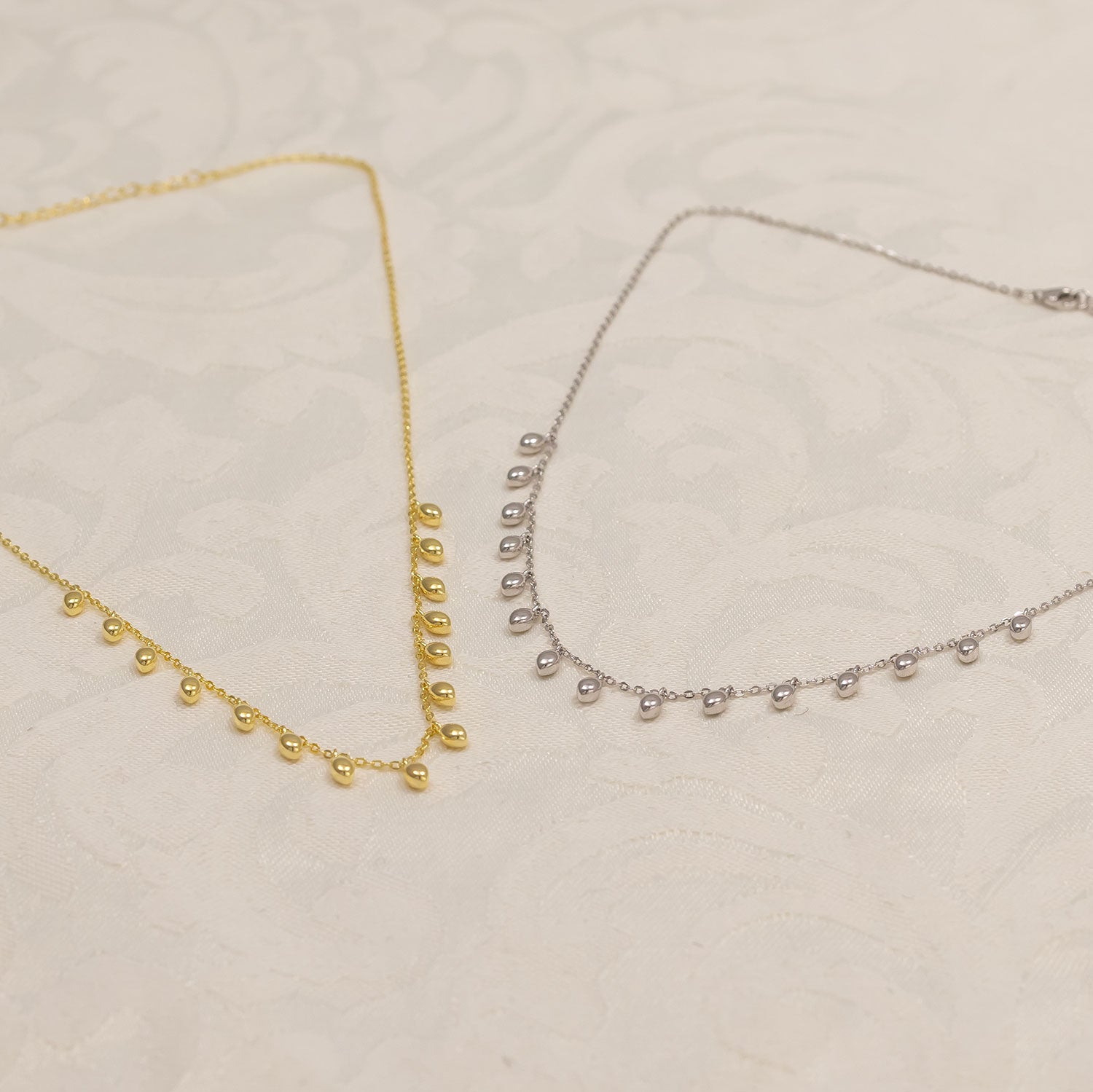 Cloudburst Dangling Raindrops Necklace