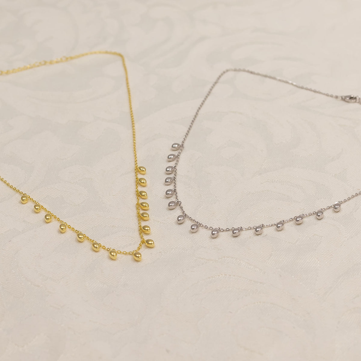 Cloudburst Dangling Raindrops Necklace