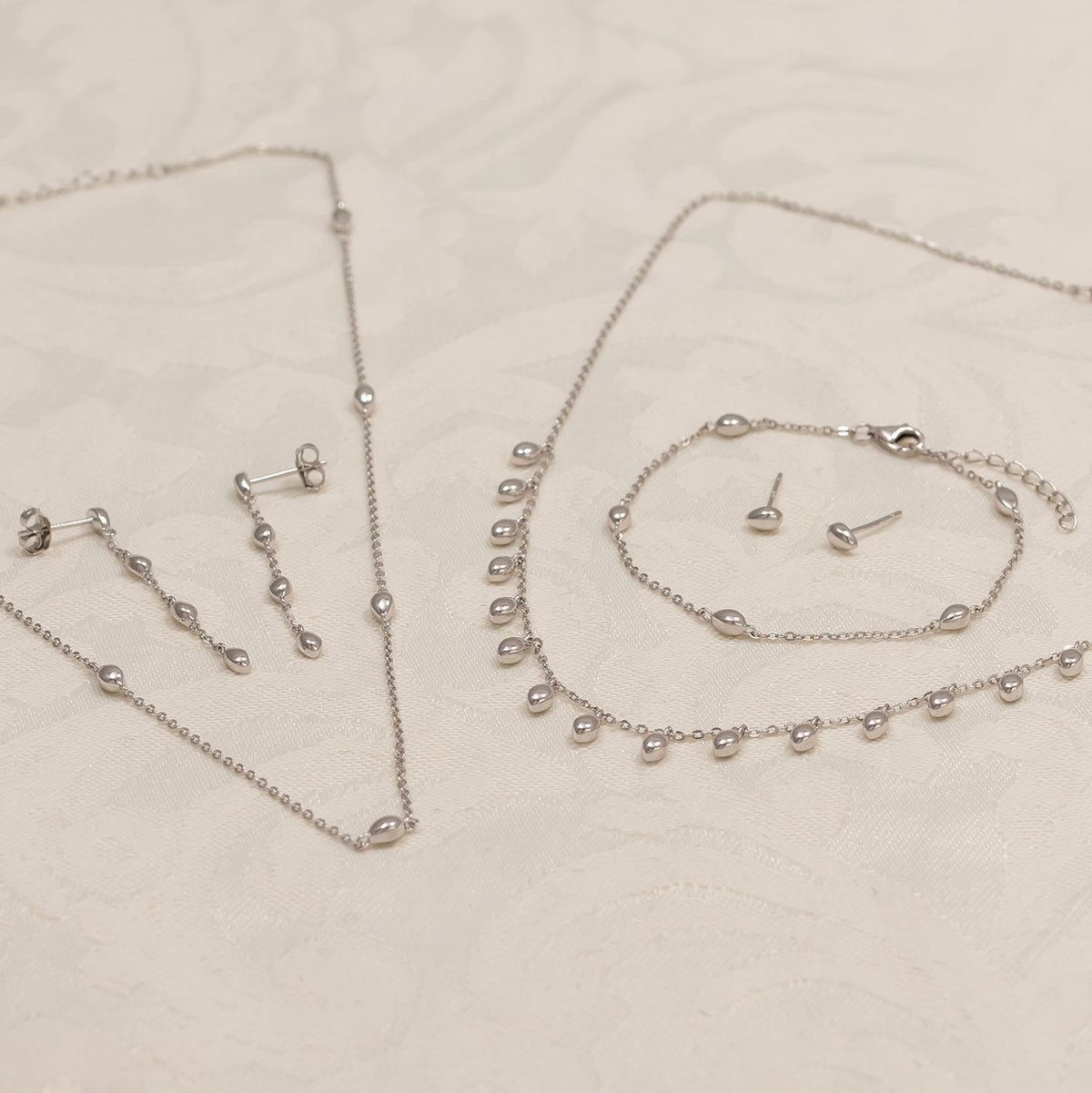 Cloudburst Raindrop Stud Earrings