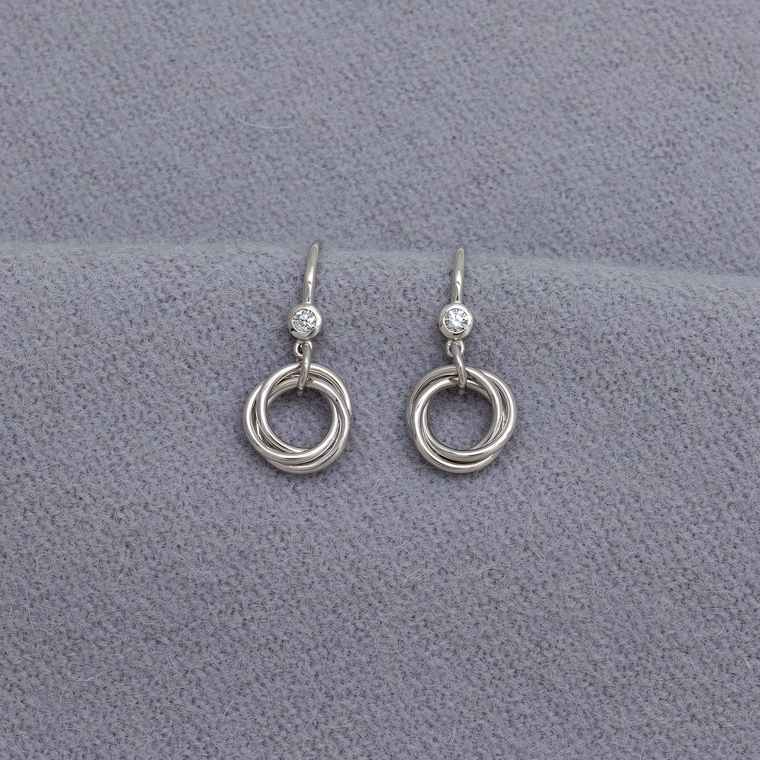 Entangled Silver & 0.15 Carat Lab Grown Diamond Love Knot Drop Earrings