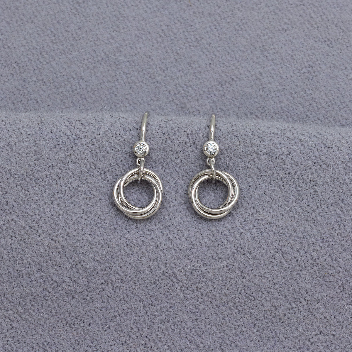 Entangled Silver & 0.15 Carat Lab Grown Diamond Love Knot Drop Earrings