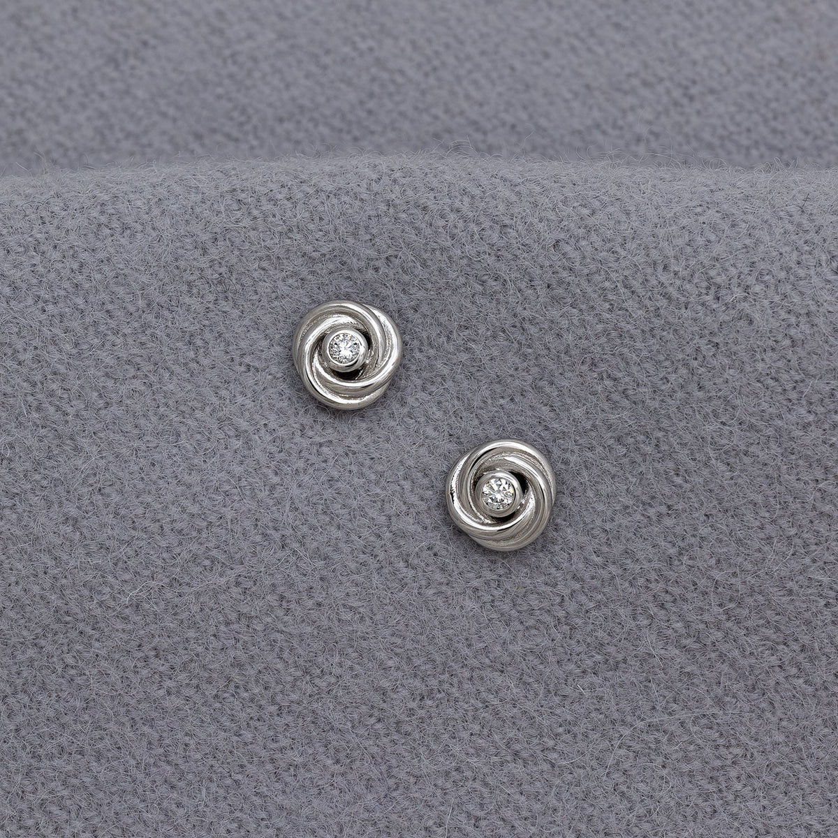 Entangled Silver & 0.13 Carat Lab Grown Diamond Love Knot Stud Earrings