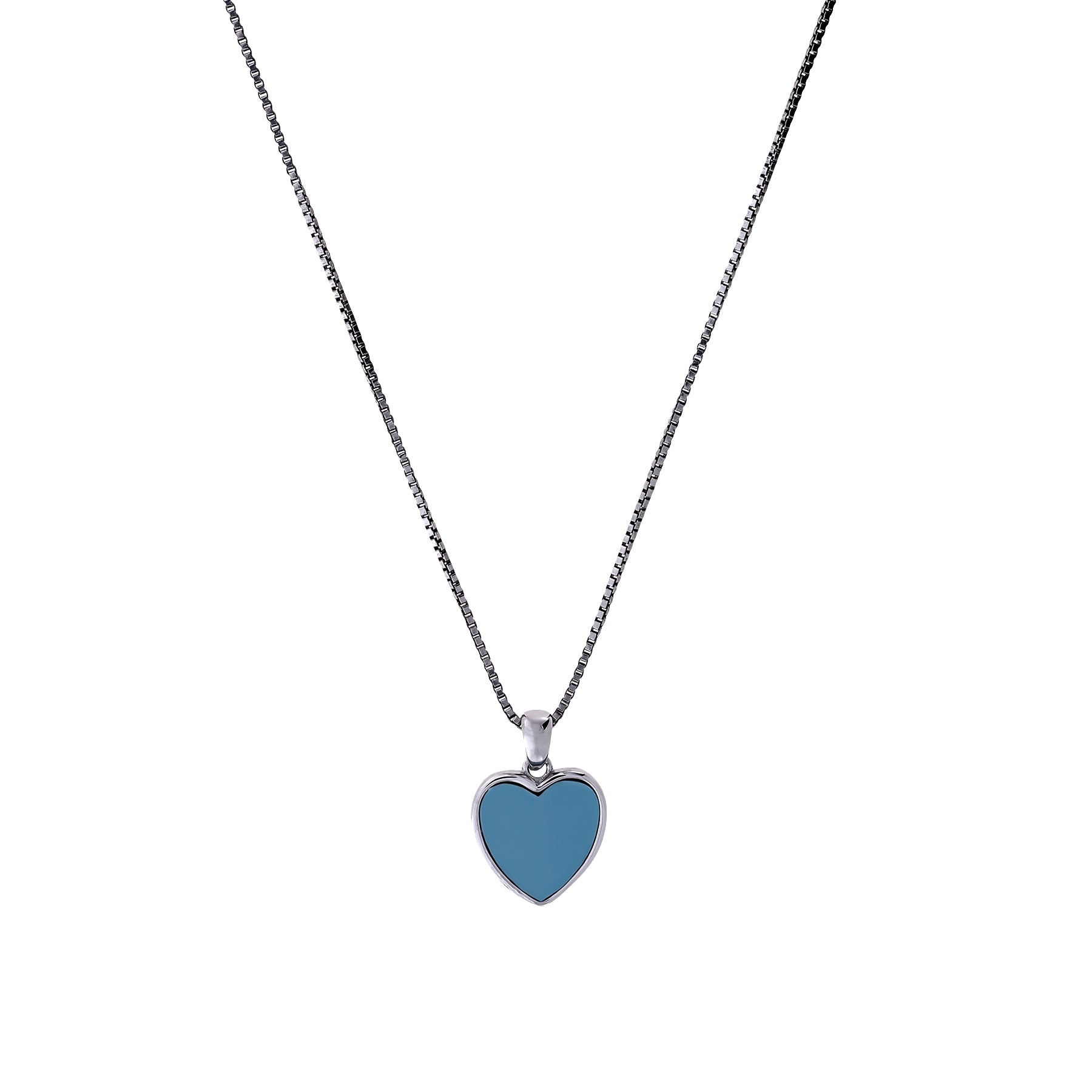 Delicate sterling silver necklace featuring a smooth turquoise heart-shaped pendant suspended from a fine chain, showcasing elegant contemporary design.