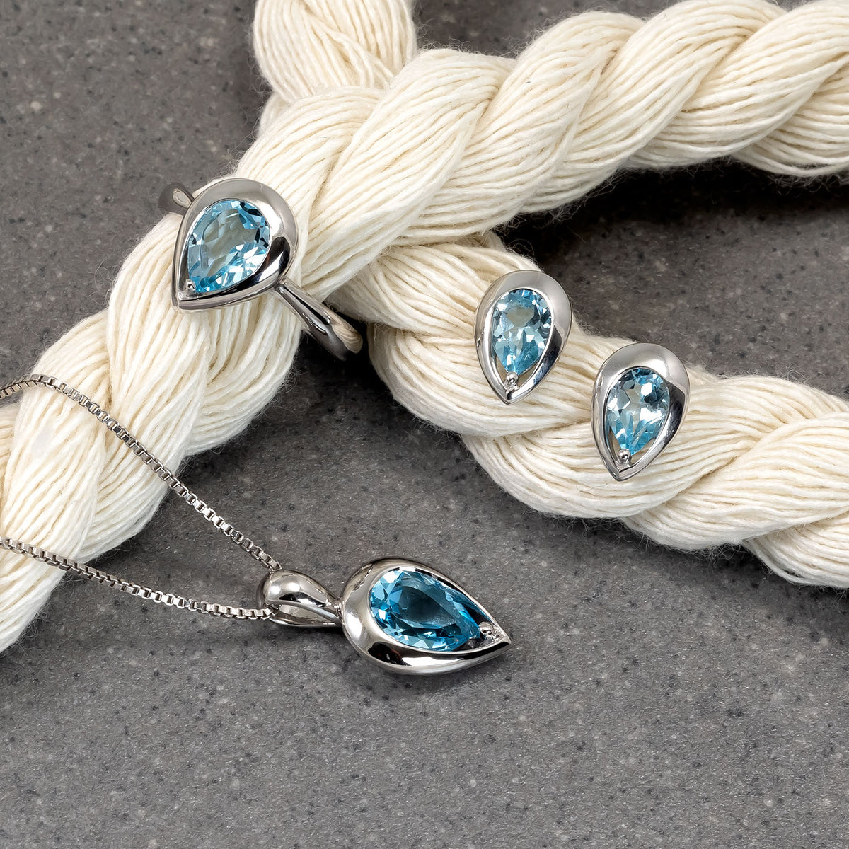 Sterling Silver & Sky Blue Topaz Teardrop Stud Earrings