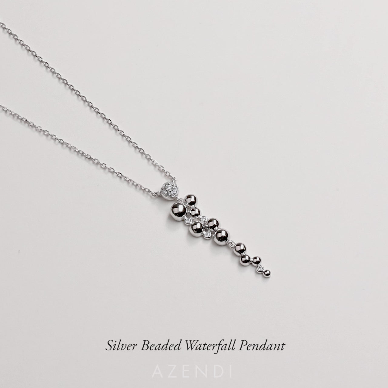 Silver Beaded Waterfall Pendant with Cubic Zirconia
