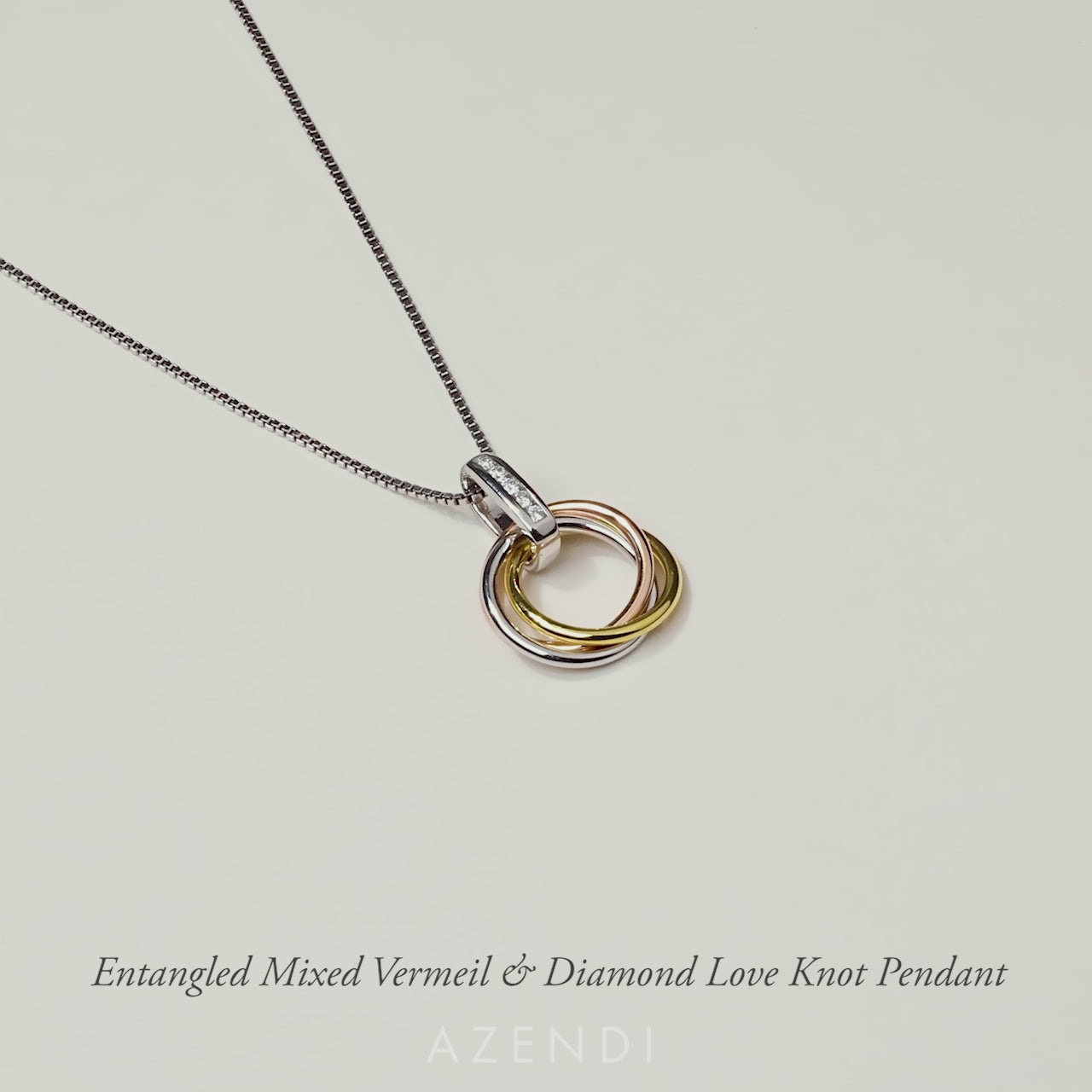 Entangled Mixed Vermeil & 0.06 Carat Lab Grown Diamond Love Knot Pendant