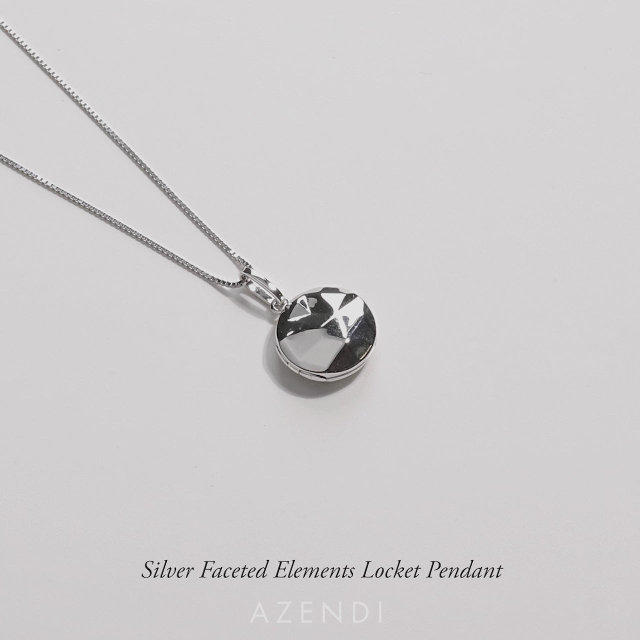 Sterling Silver Faceted Elements Locket Pendant