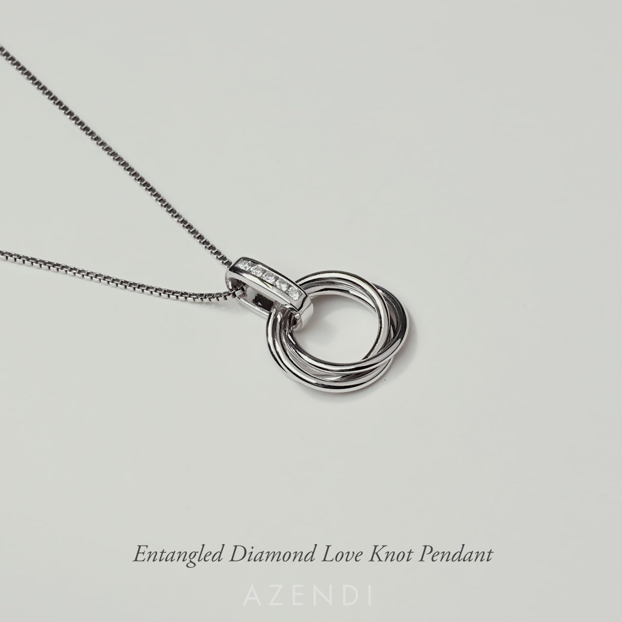 Entangled Silver & 0.06 Carat Lab Grown Diamond Love Knot Pendant