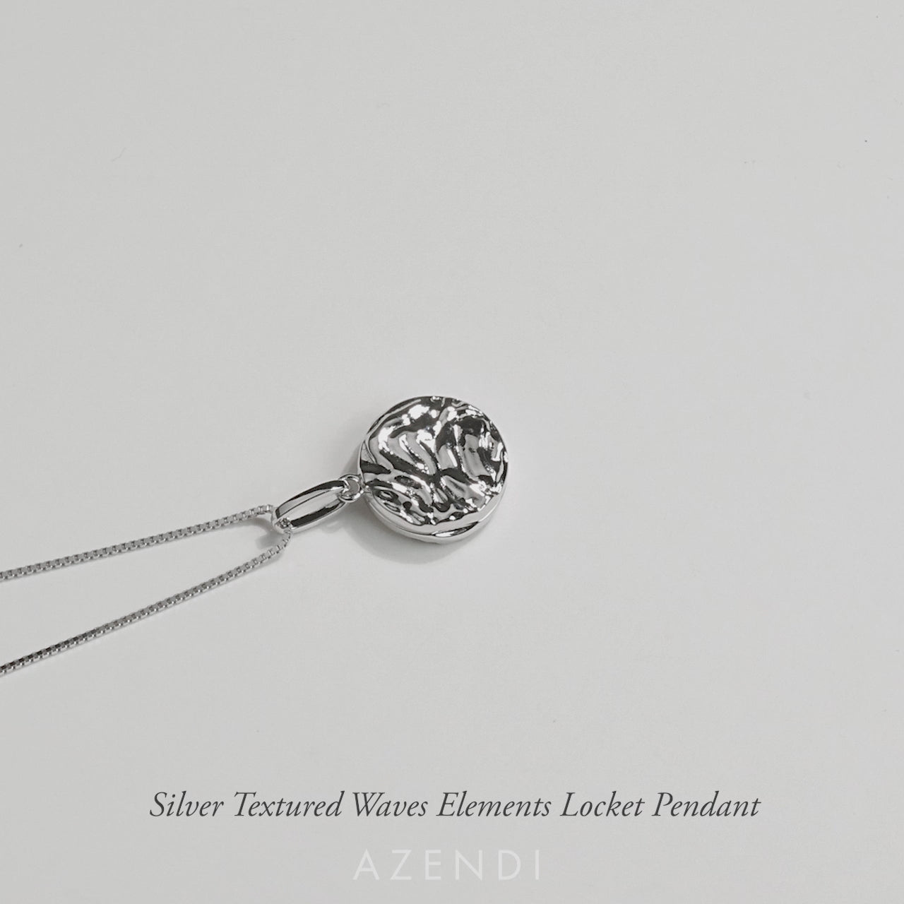 Sterling Silver Textured Waves Elements Locket Pendant