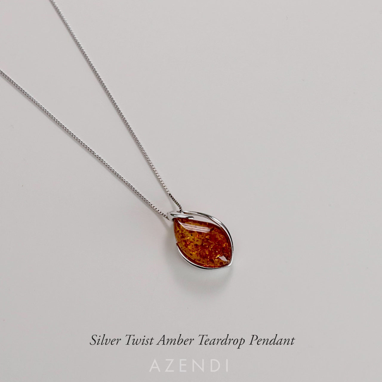 Silver Twist Amber Teardrop Pendant