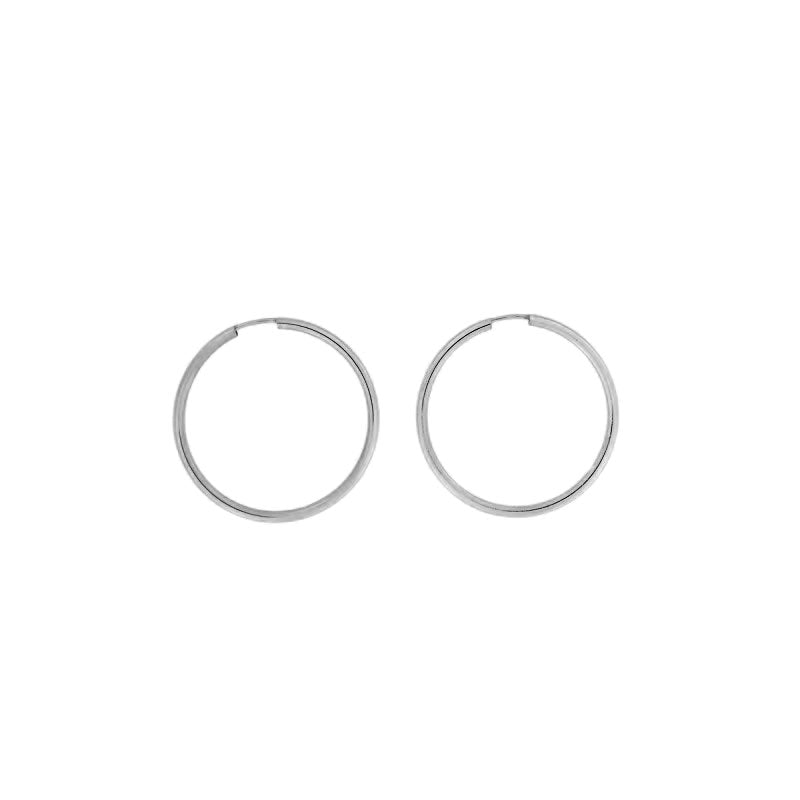 Pair of classic sterling silver hoop earrings measuring 3cm in diameter, featuring a smooth polished finish for timeless elegance in contemporary silver jewellery.