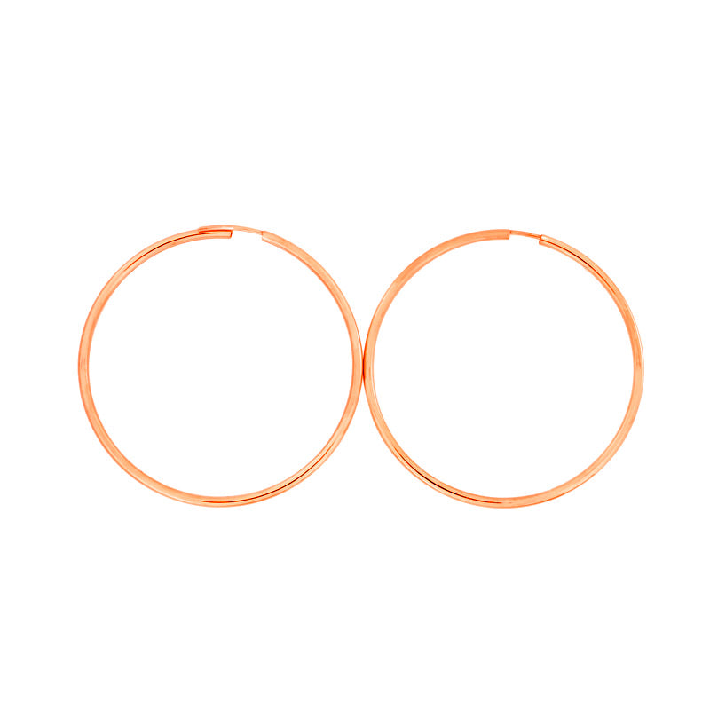 Pair of polished rose gold vermeil hoop earrings with a smooth circular silhouette, reflecting timeless elegance in fine designer silver jewellery.