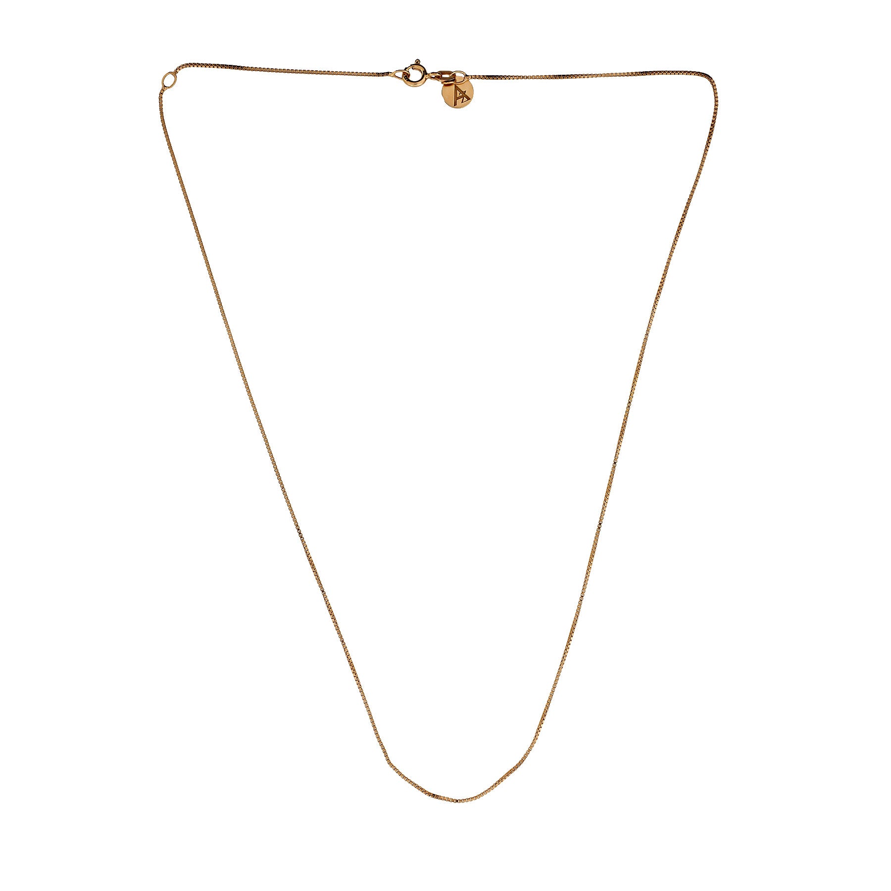 Delicate gold vermeil adjustable box chain necklace with a subtle shine, featuring a small circular charm near the clasp against a white background.