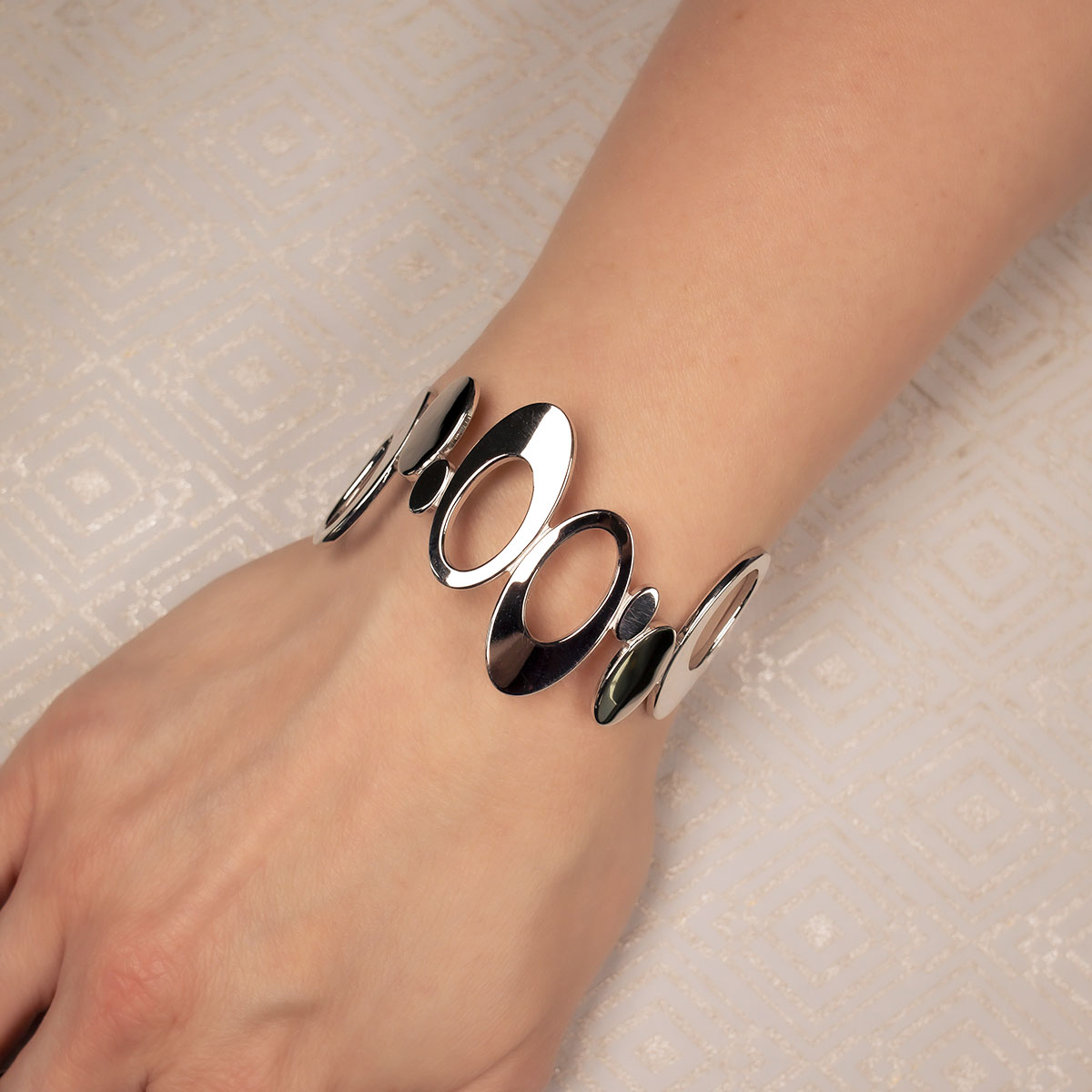 Silver Cuff Bangle With Oval Abstract Design