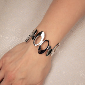 Silver Cuff Bangle With Oval Abstract Design