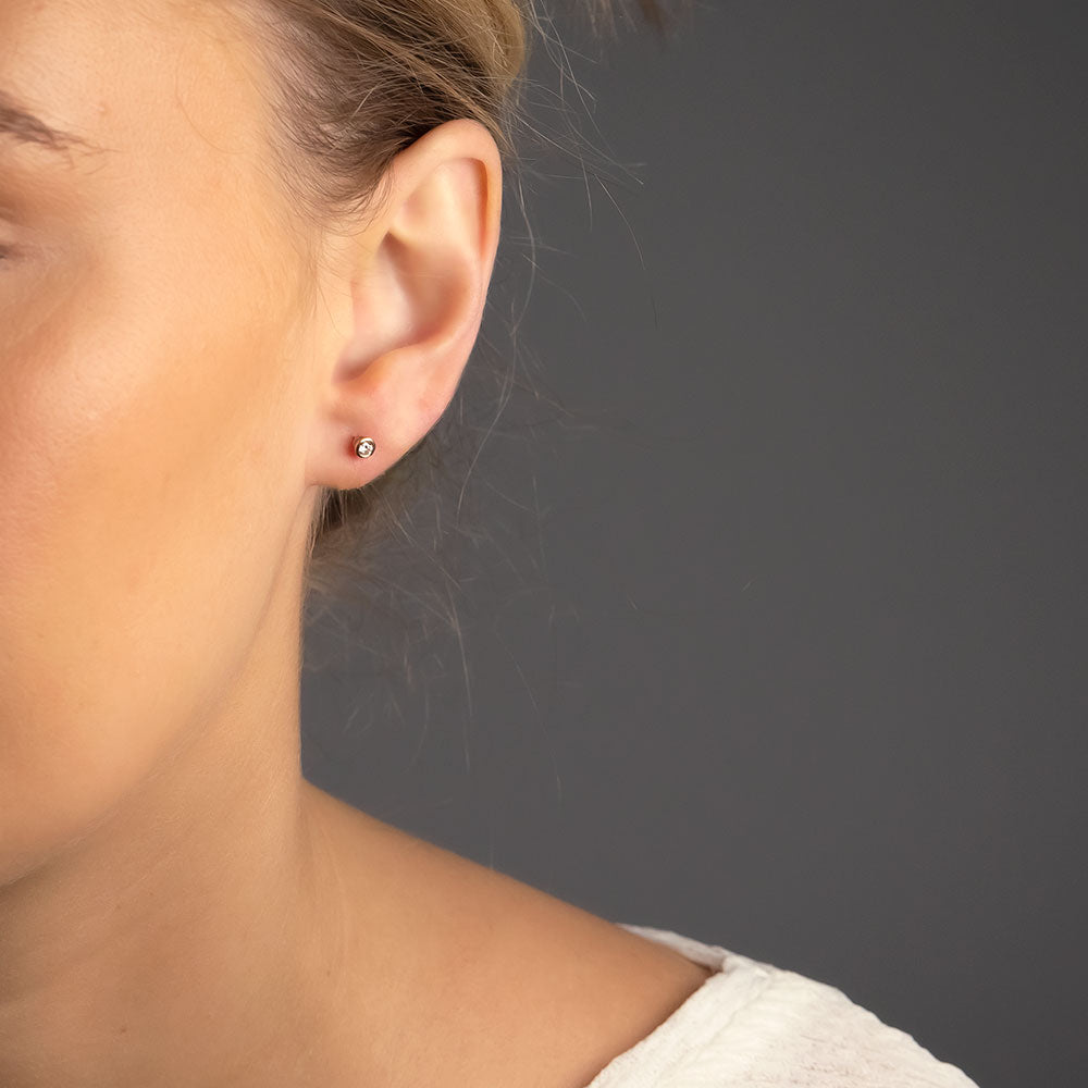 9 Carat Gold & Diamond Stud Earrings (0.14ct diamond)