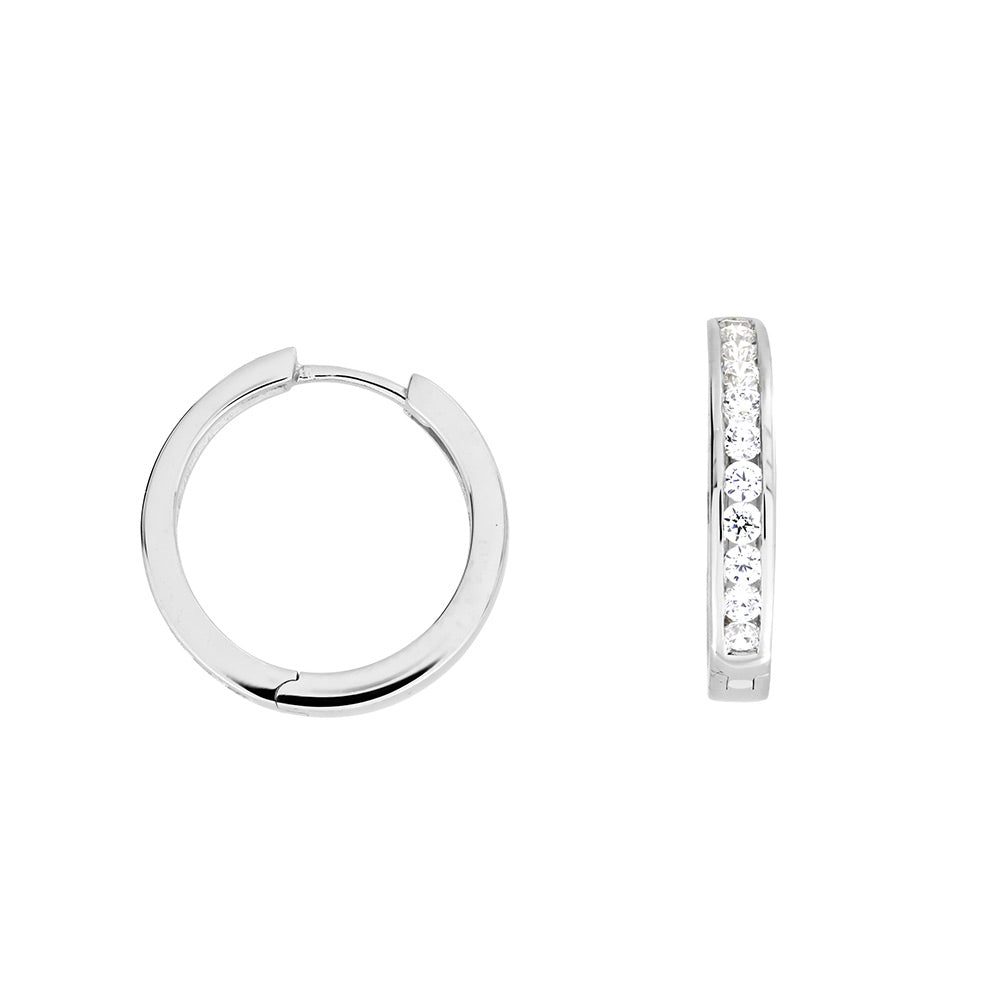 Medium-sized sterling silver hoop earrings featuring a row of sparkling stones set along the outer edge, combining classic elegance with contemporary British design.