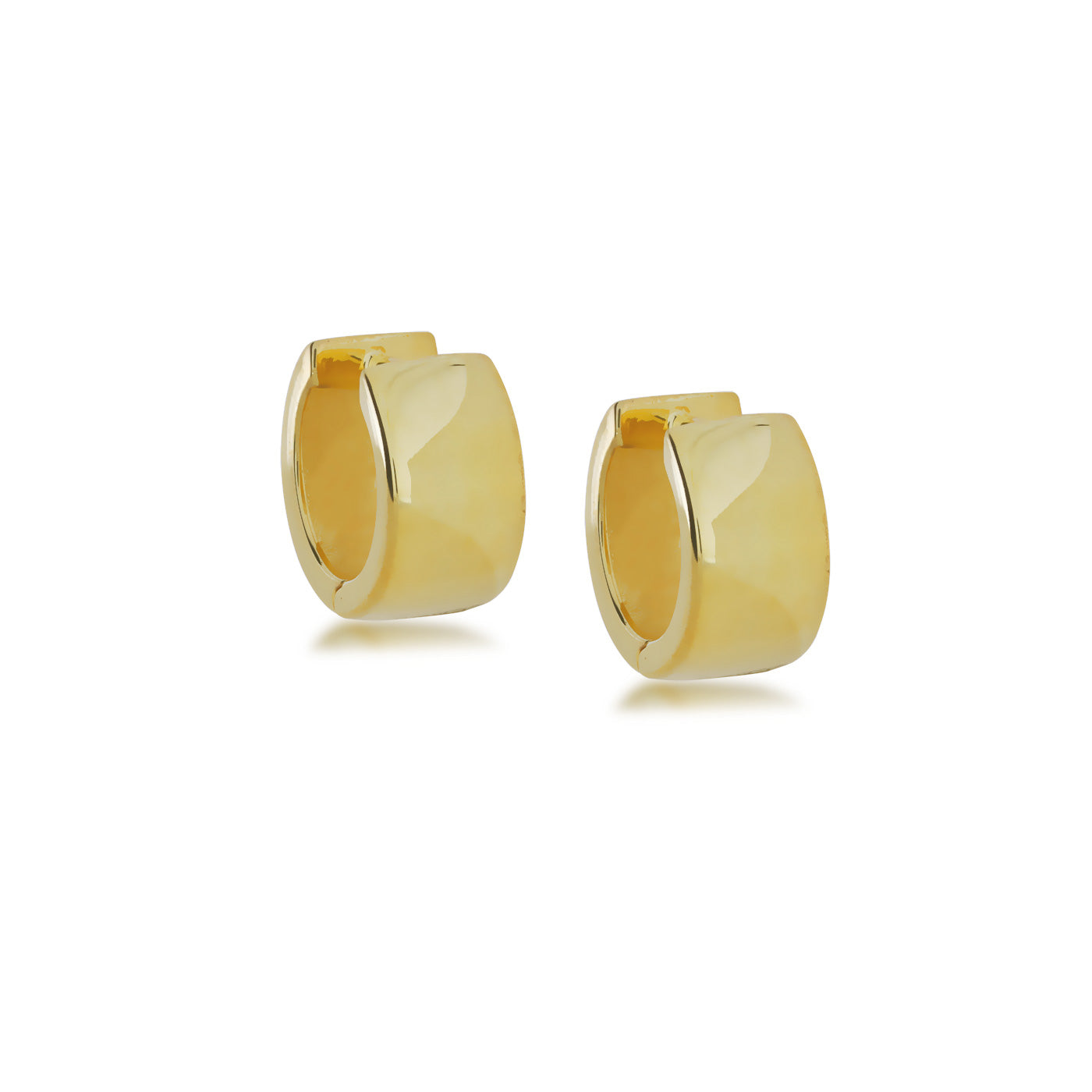 Pair of polished medium-wide hinged hoop earrings in sterling silver with a smooth, sculptural surface, exemplifying modern British silver jewellery design.