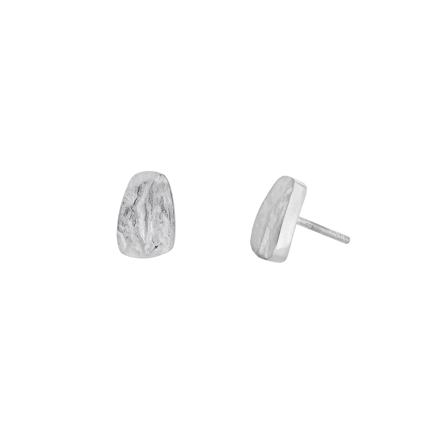 Pair of sterling silver stud earrings inspired by natural pebble shapes, featuring subtle textured surfaces for a modern and sculptural jewellery look.