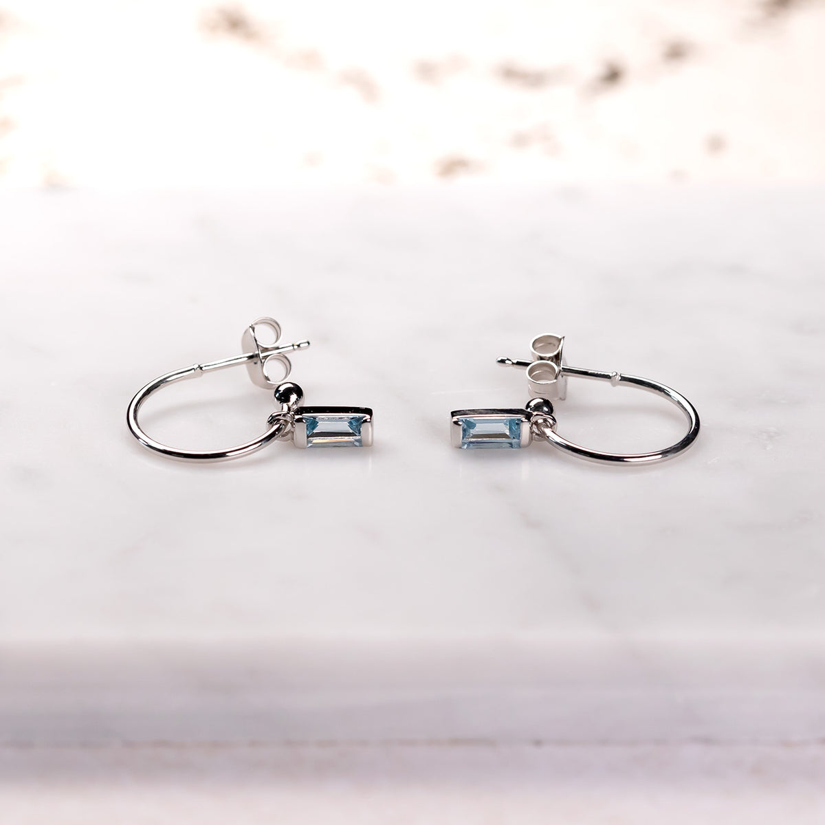 Sterling Silver Blue Topaz Baguette Mini Hoop Earrings