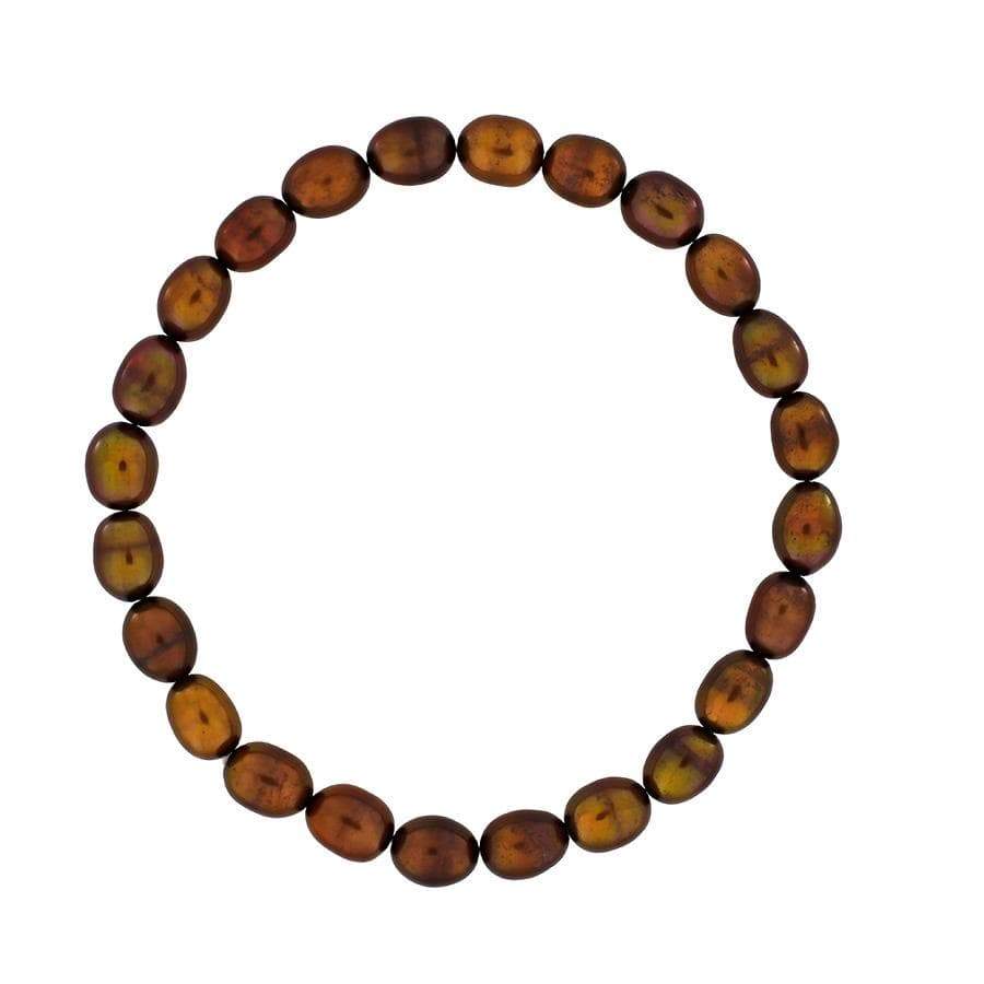 Stretch bracelet featuring warm-toned freshwater pearls in an adjustable design, showcasing elegant and sculptural sterling silver jewellery craftsmanship.
