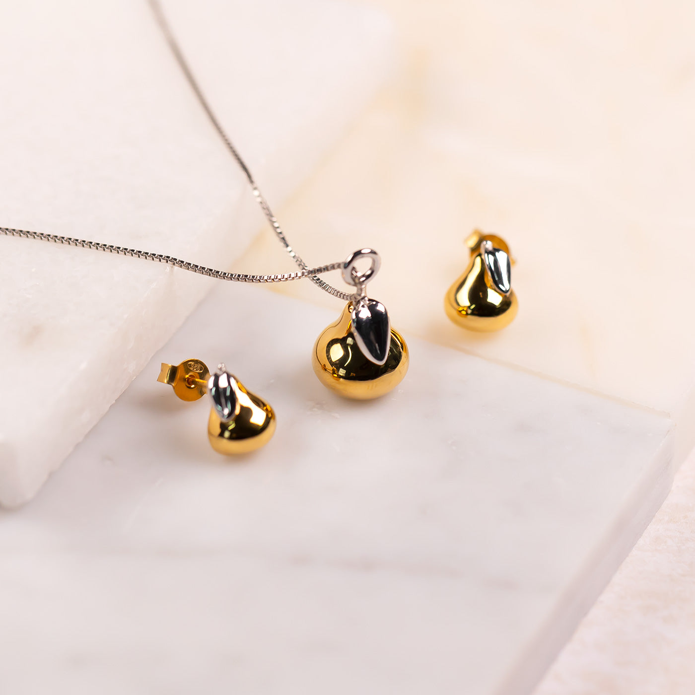 925 Sterling Silver Pendant outlet with Pear shaped Cubic Zirconia and Gold Vermeil.