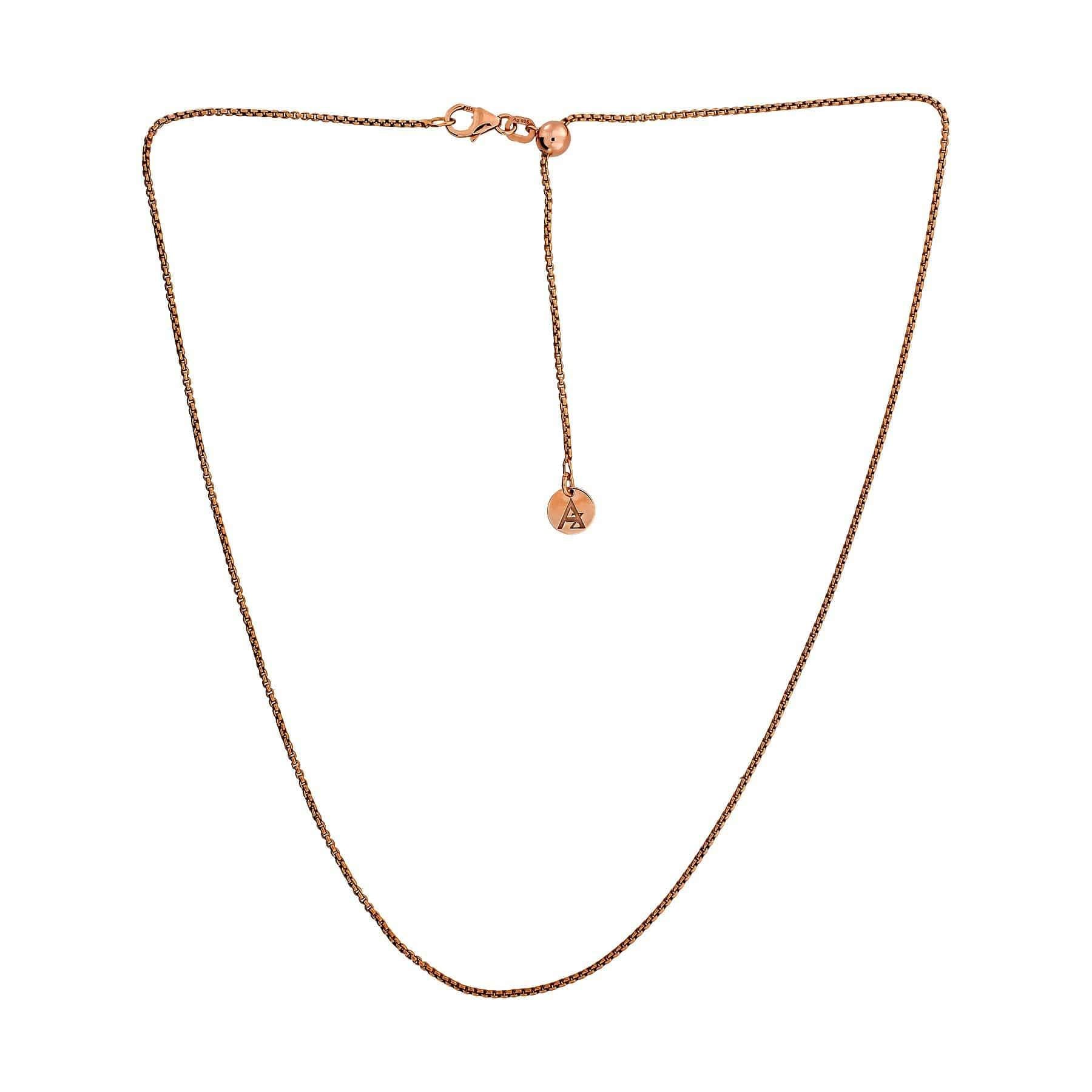 Delicate rose gold vermeil Rollo chain necklace featuring a sliding adjuster for customizable length, highlighting a minimalist and sculptural design aesthetic.